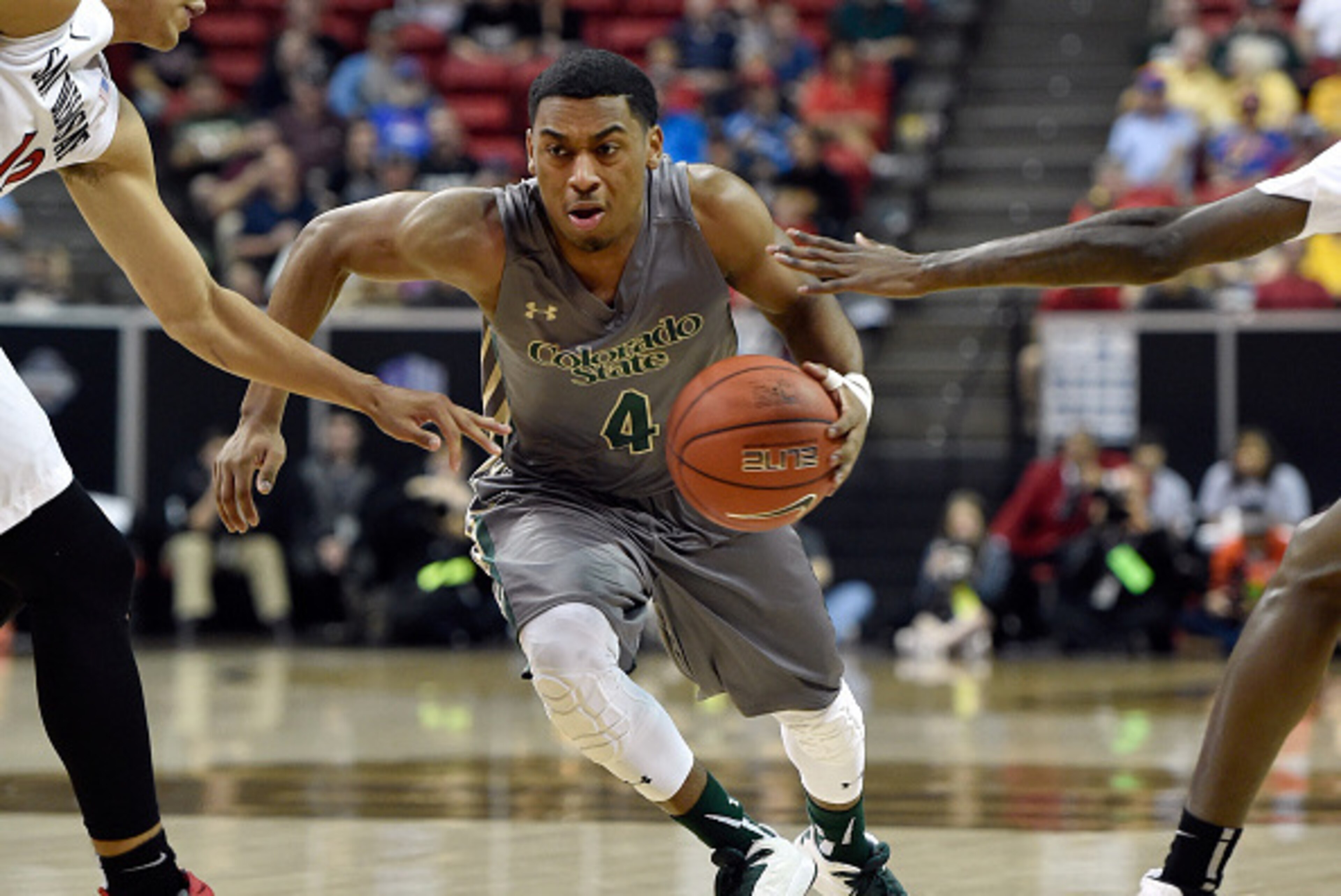 LAS VEGAS, NV - MARCH 13:  John Gillon #4 of the Colorado State Rams drives the ball up court against the San Diego State Aztecs during a semifinal game of the Mountain West Conference basketball tournament at the Thomas & Mack Center on March 13, 2015 in
