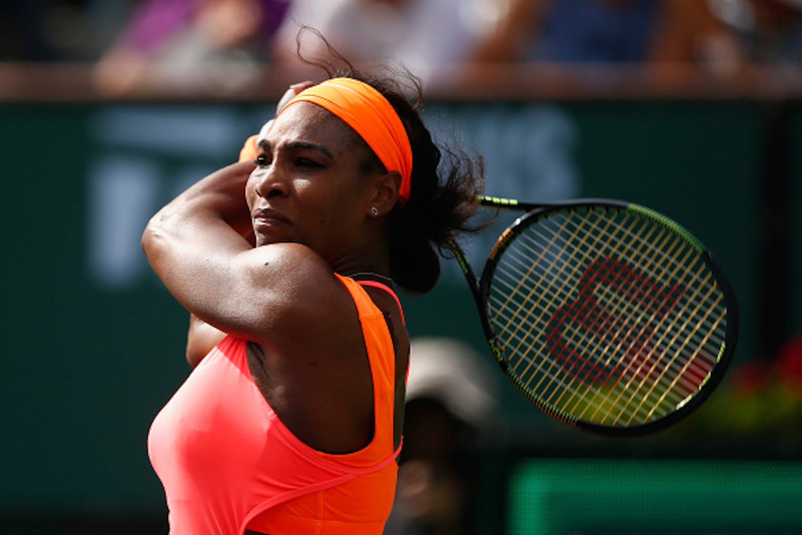INDIAN WELLS, CA - MARCH 17:  Serena Williams of USA in action against Sloane Stephens of USA during day nine of the BNP Paribas Open tennis at the Indian Wells Tennis Garden on March 17, 2015 in Indian Wells, California.  (Photo by Julian Finney/Getty Im