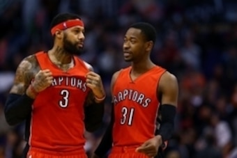 Jan 4, 2015; Phoenix, AZ, USA; Toronto Raptors forward James Johnson (3) and forward Terrence Ross (31) against the Phoenix Suns at US Airways Center. The Suns defeated the Raptors 125-109. Mandatory Credit: Mark J. Rebilas-USA TODAY Sports