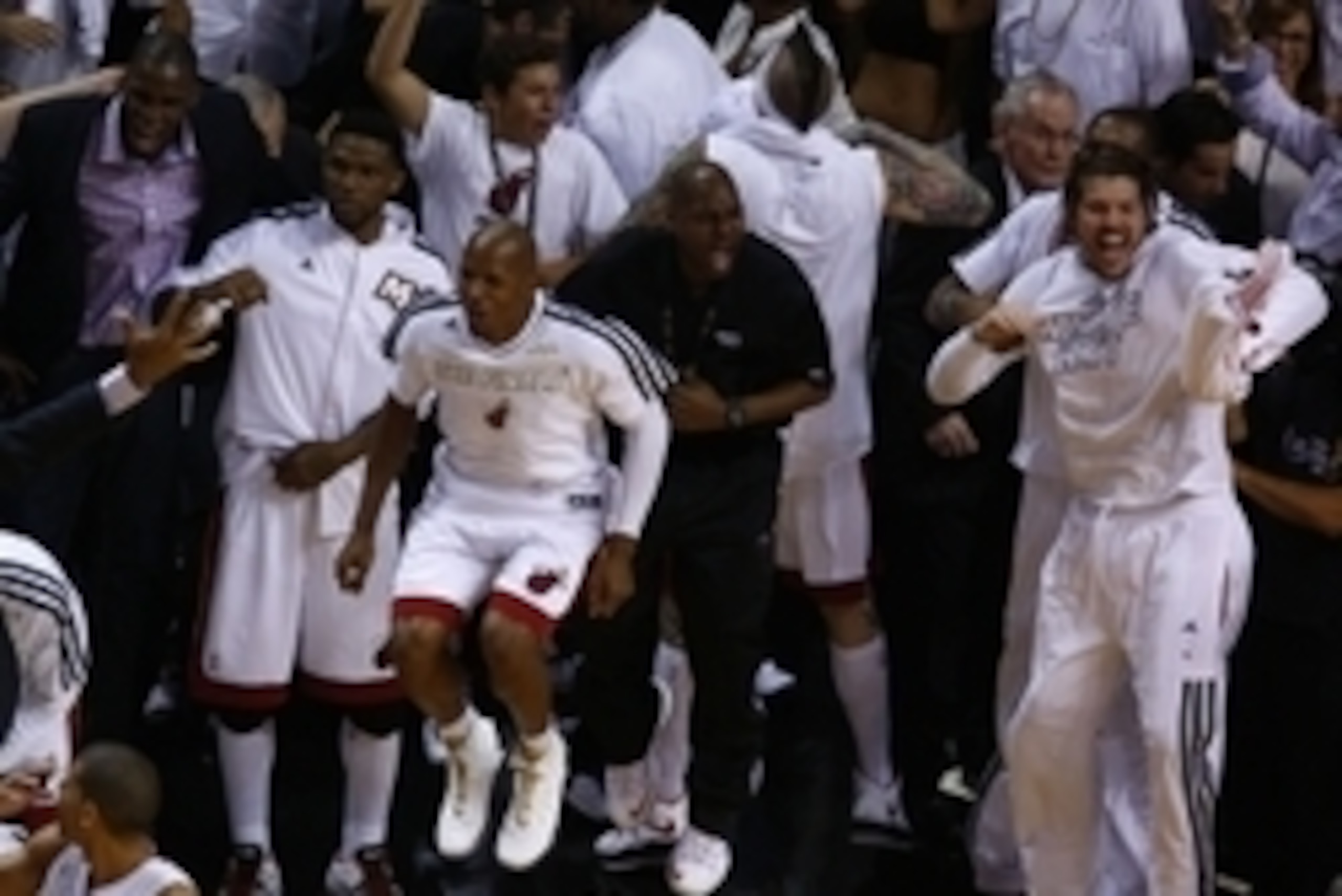 Jun 20, 2013; Miami, FL, USA; Miami Heat shooting guard Ray Allen celebrates on the bench after game seven in the 2013 NBA Finals at American Airlines Arena. Miami defeated San Antonio Spurs 95-88 to win the NBA Championship. Mandatory Credit: Robert Maye