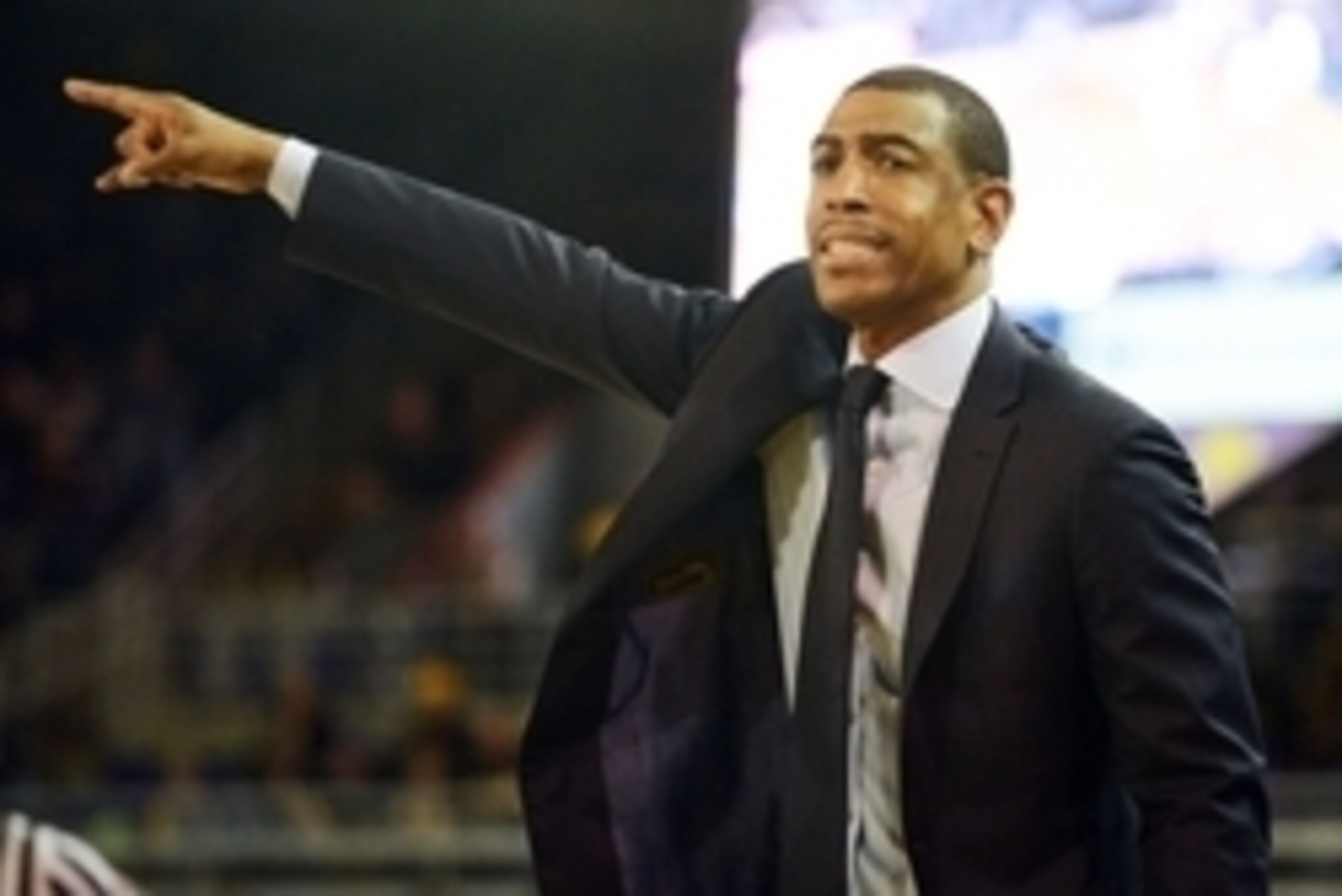 Feb 25, 2015; Greenville, NC, USA; Connecticut Huskies head coach Kevin Ollie gestures during the second half against the East Carolina Pirates at Williams Arena at Minges Coliseum. Connecticut won 60-49. Mandatory Credit: Rob Kinnan-USA TODAY Sports Feb 25, 2015; Greenville, NC, USA; Connecticut Huskies head coach Kevin Ollie gestures during the second half against the East Carolina Pirates at Williams Arena at Minges Coliseum. Connecticut won 60-49. Mandatory Credit: Rob Kinnan-USA TODAY Sports