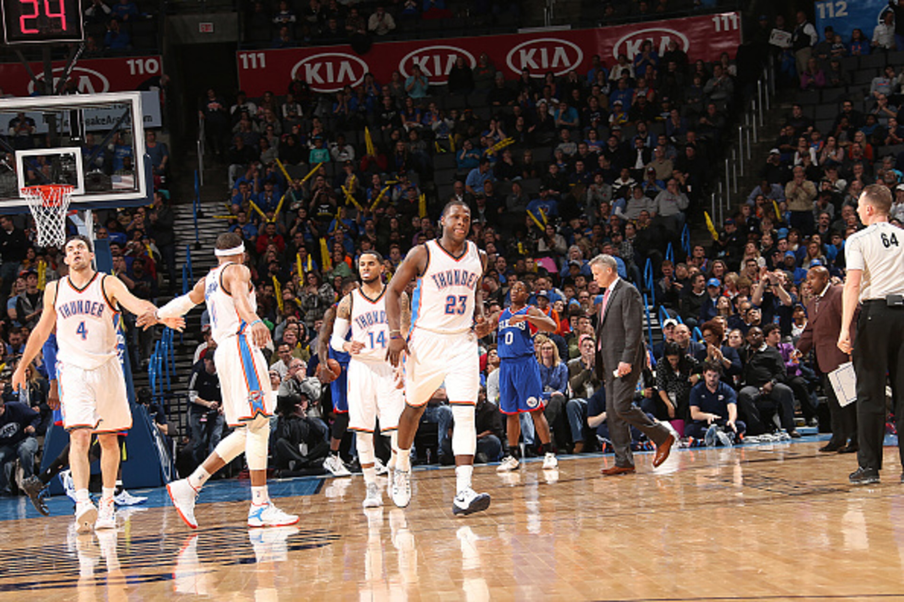 OKLAHOMA CITY, OK- March 4:  Dion Waiters #23 of the Oklahoma City Thunder celebrates with his teammates during the game against the Philadelphia 76ers on March 4, 2015 at Chesapeake Energy Arena in Oklahoma City, Oklahoma. NOTE TO USER: User expressly ac