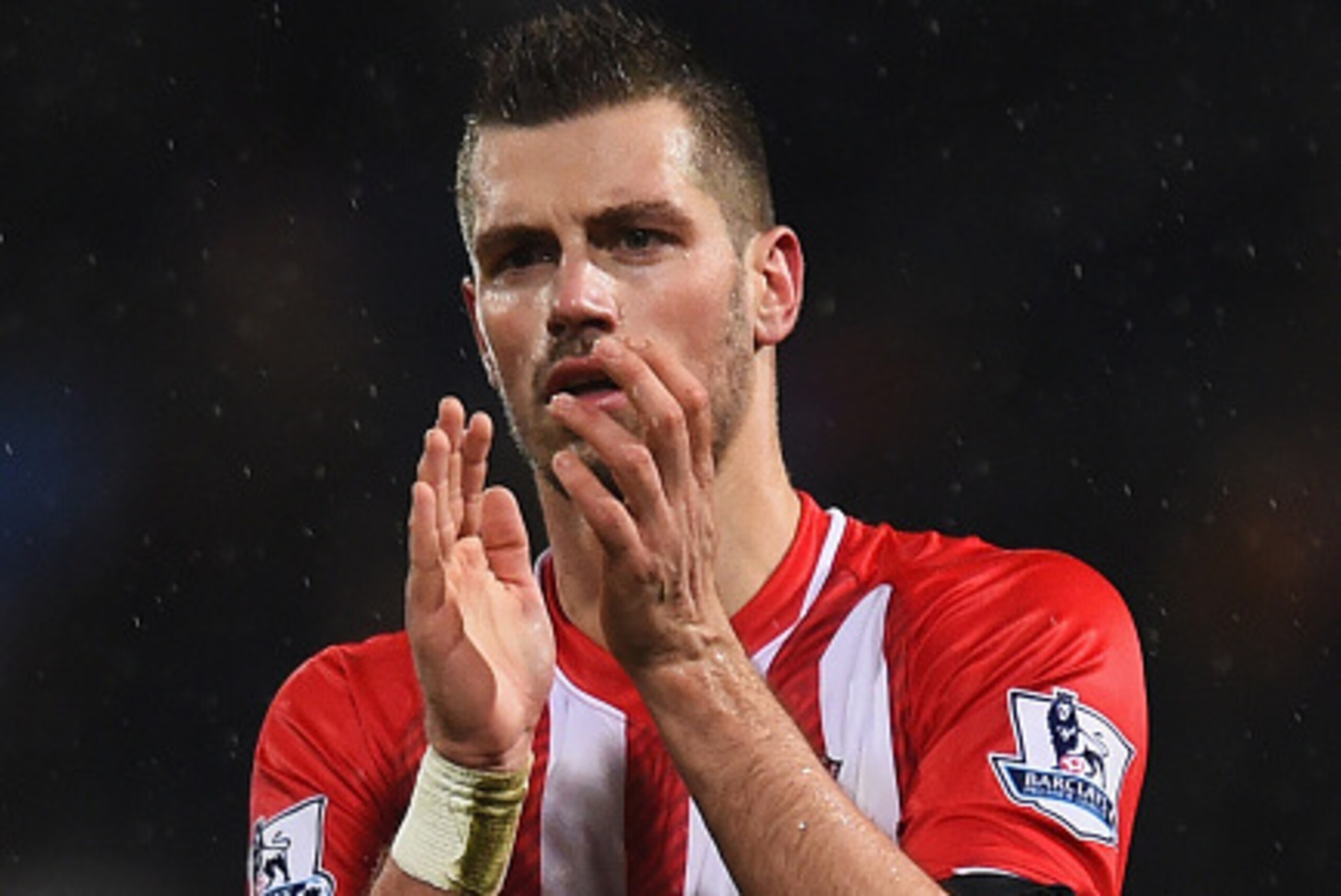 LONDON, ENGLAND - DECEMBER 26:  Morgan Schneiderlin of Southampton applauds the travelling fans after the Barclays Premier League match between Crystal Palace and Southampton at Selhurst Park on December 26, 2014 in London, England.  (Photo by Christopher