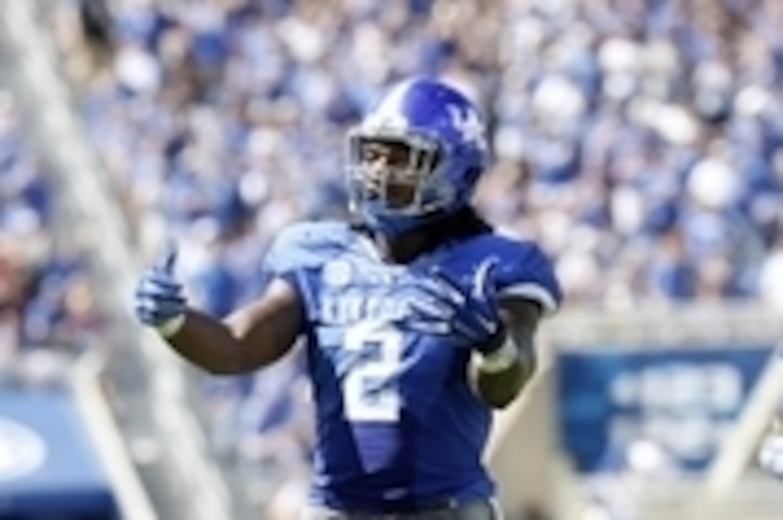 Sep 27, 2014; Lexington, KY, USA; Kentucky Wildcats defensive end Alvin Dupree (2) celebrates during the game against the Vanderbilt Commodores in the second half at Commonwealth Stadium. Kentucky defeated Vanderbilt 17-7. Mandatory Credit: Mark Zerof-USA
