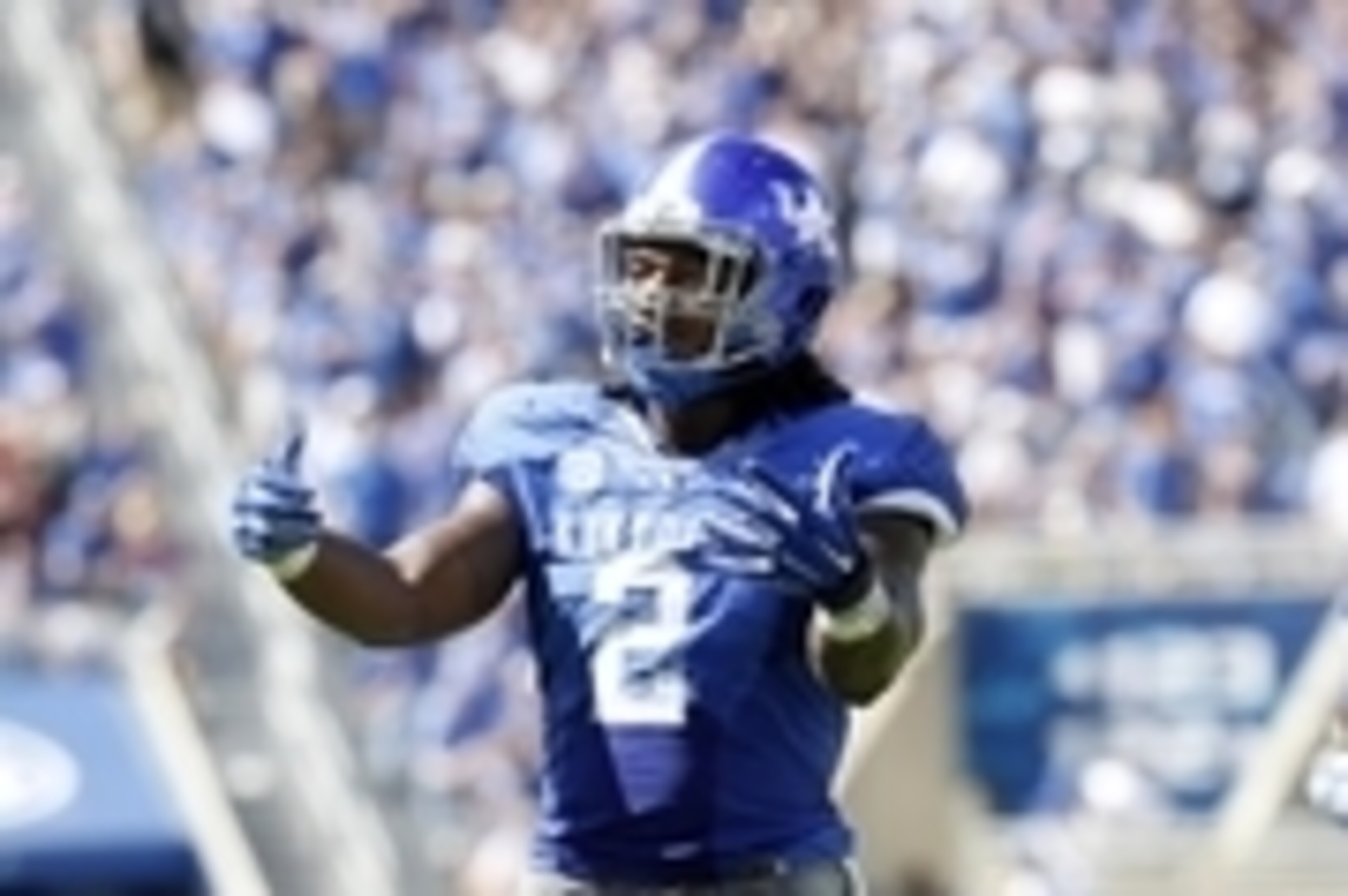 Sep 27, 2014; Lexington, KY, USA; Kentucky Wildcats defensive end Alvin Dupree (2) celebrates during the game against the Vanderbilt Commodores in the second half at Commonwealth Stadium. Kentucky defeated Vanderbilt 17-7. Mandatory Credit: Mark Zerof-USA