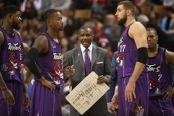 Nov 28, 2014; Toronto, Ontario, CAN; Toronto Raptors head coach Dwane Casey talks to his players as forward Amir Johnson (15) and guard Terrence Ross (31) and center Jonas Valanciunas (17) and point guard Kyle Lowry (7) look on against the Dallas Maverick