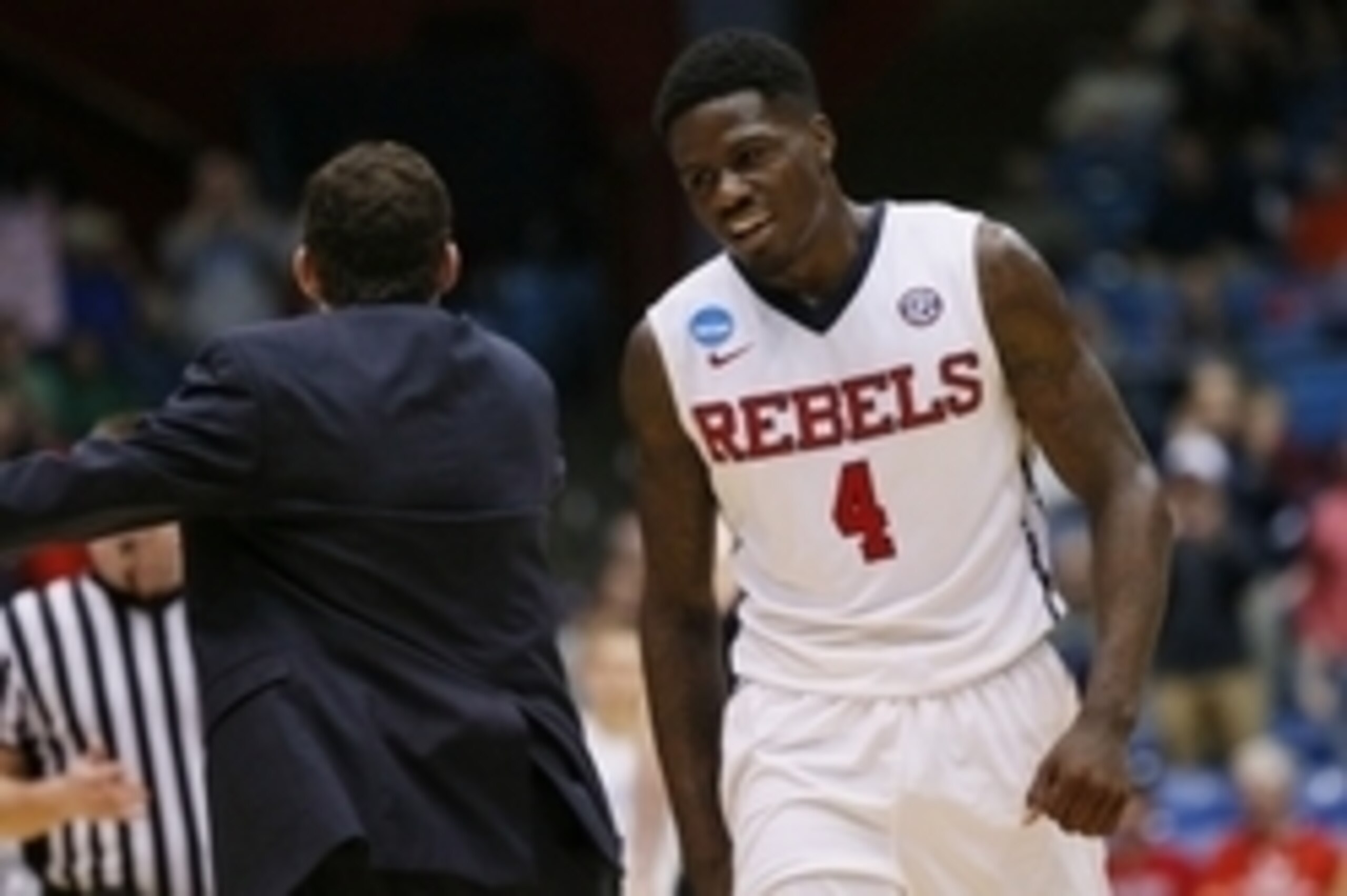 Mar 17, 2015; Dayton, OH, USA; Mississippi Rebels forward M.J. Rhett (4) reacts after making a three-pointer during the second half against the Brigham Young Cougars in the first round of the 2015 NCAA Tournament at UD Arena. Mandatory Credit: Rick Osento