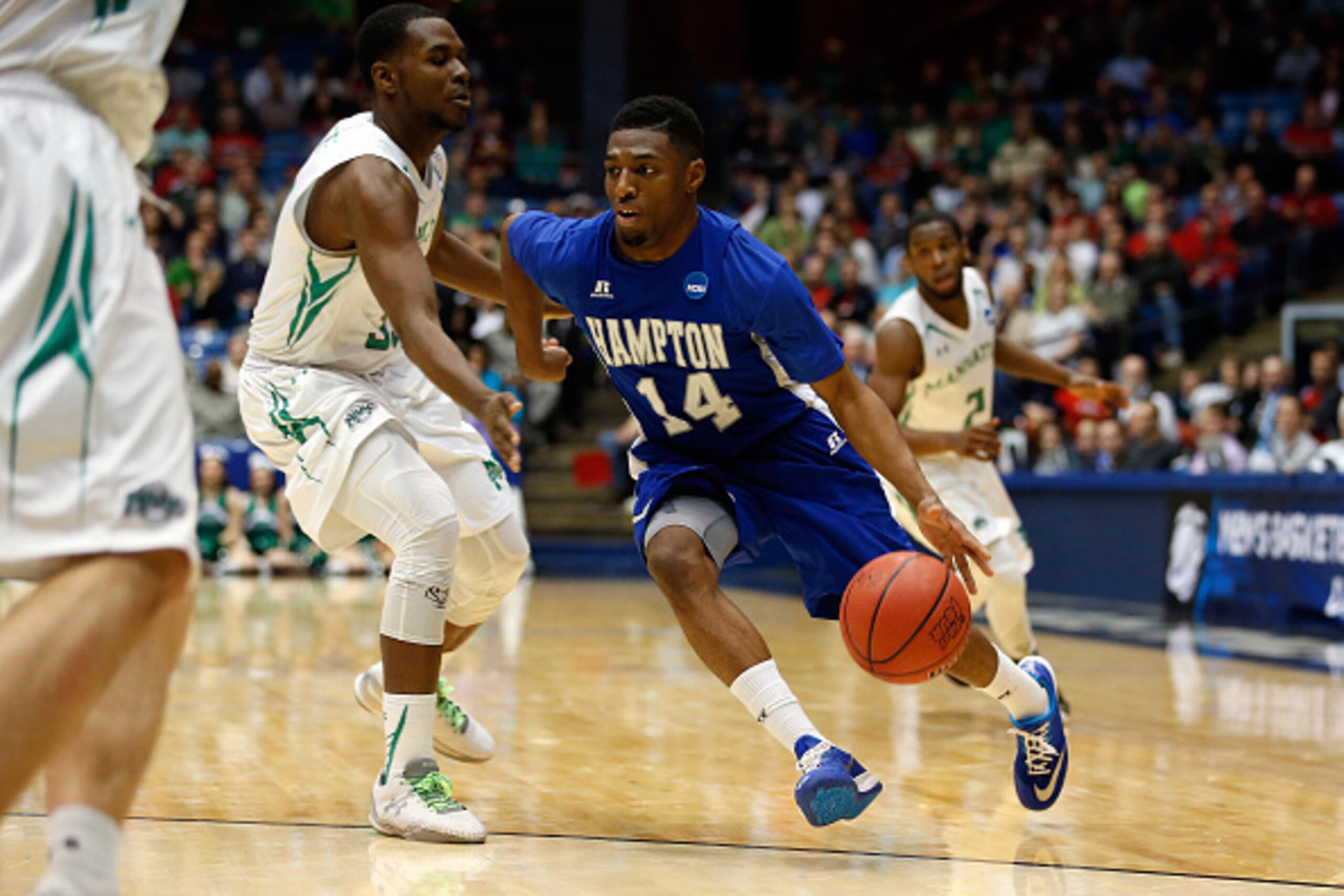 DAYTON, OH - MARCH 17: Brian Darden #14 of the Hampton Pirates drives to the basket against the Manhattan Jaspers during the first round of the 2015 NCAA Men's Basketball Tournament at UD Arena on March 17, 2015 in Dayton, Ohio.  (Photo by Gregory Shamus/