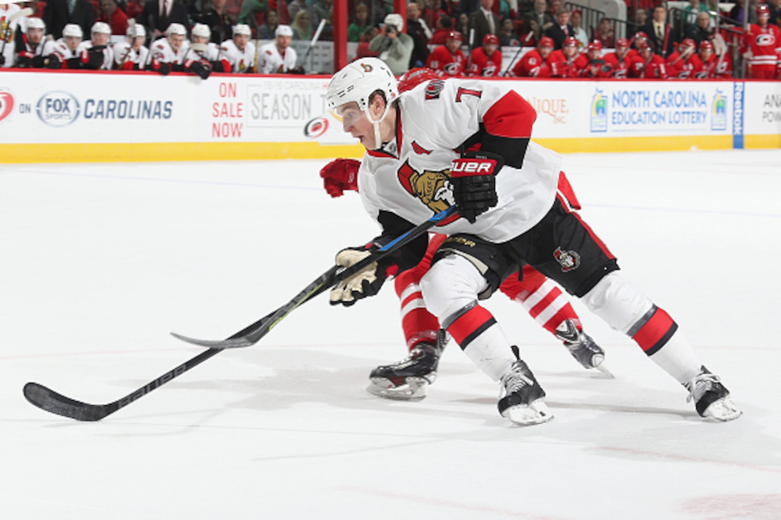 RALEIGH, NC - MARCH 17: Kyle Turris #7 of the Ottawa Senators does a toe drag move and slashes toward the crease passing the puck that leads to an overtime goal during their NHL game against the Carolina Hurricanes at PNC Arena on March 17, 2015 in Raleig