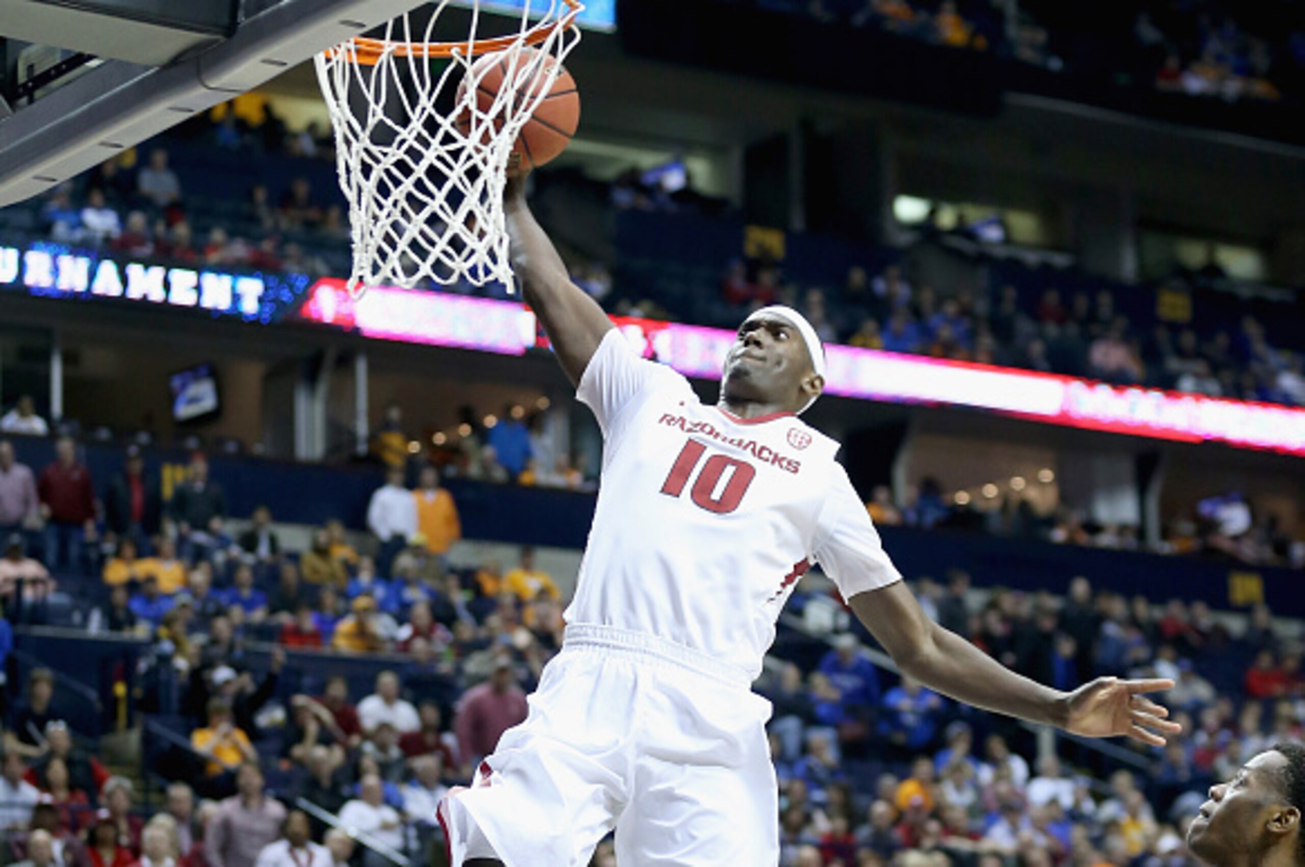NASHVILLE, TN - MARCH 13:  Bobby Portis #10 of the Arkansas Razorbacks dunks the ball against the Tennessee Volunteers during the quaterfinals of the SEC Basketball Tournament at Bridgestone Arena on March 13, 2015 in Nashville, Tennessee.  (Photo by Andy
