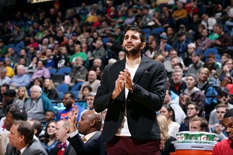 MINNEAPOLIS, MN - JANUARY 28: Ricky Rubio #9 of the Minnesota Timberwolves celebrates during a game against the Boston Celtics on January 28, 2015 at Target Center in Minneapolis, Minnesota. NOTE TO USER: User expressly acknowledges and agrees that, by do