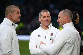 LONDON, ENGLAND - FEBRUARY 14:  England head coach Stuart Lancaster (C) talks with Attacking Skills Coach Mike Catt (R) and Forwards Coach Graham Rowntree after the RBS Six Nations match between England and Italy at Twickenham Stadium on February 14, 2015
