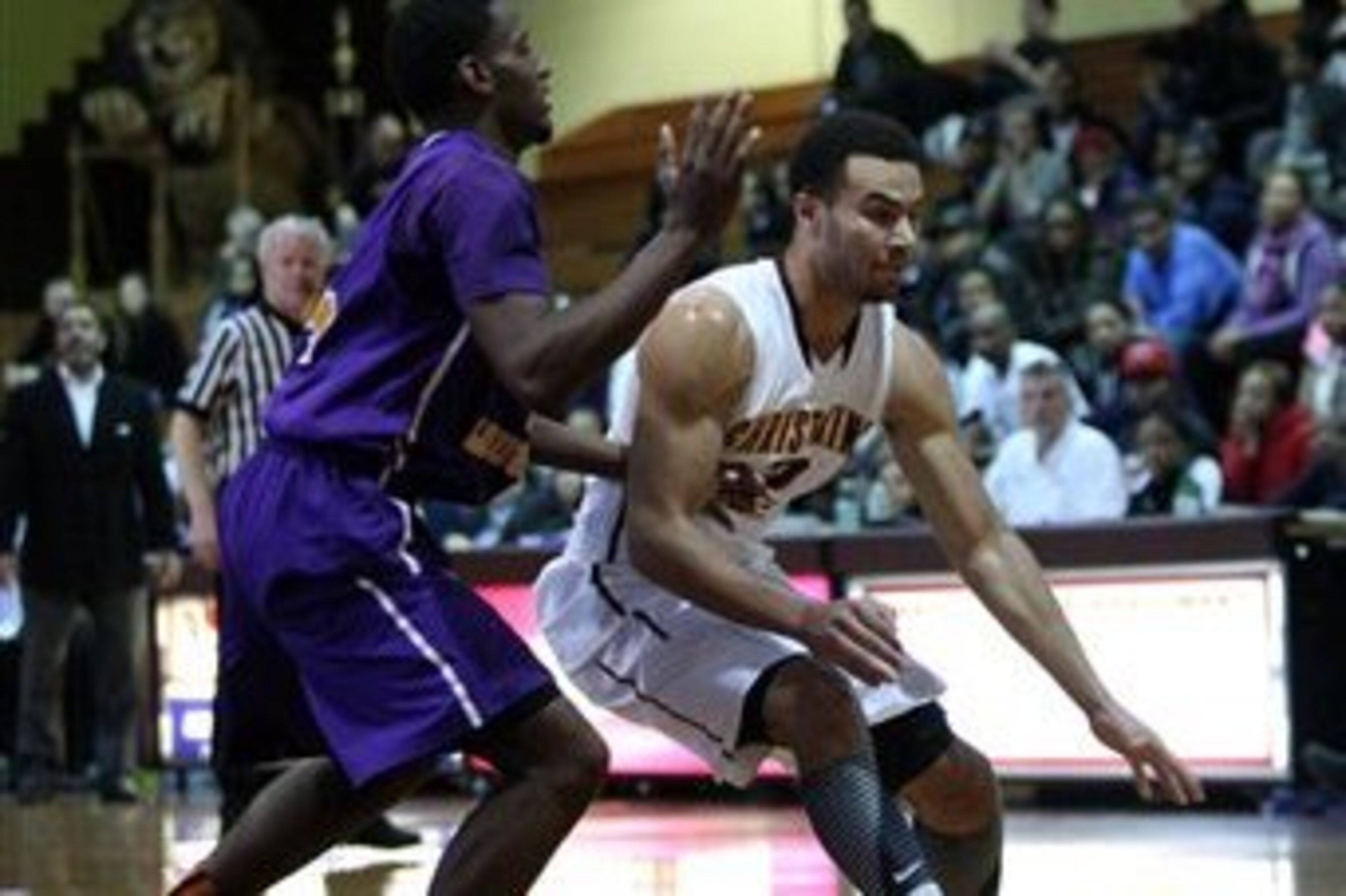 Jordan Fuchs (right) was a star for powerhouse Christ the King in high school.