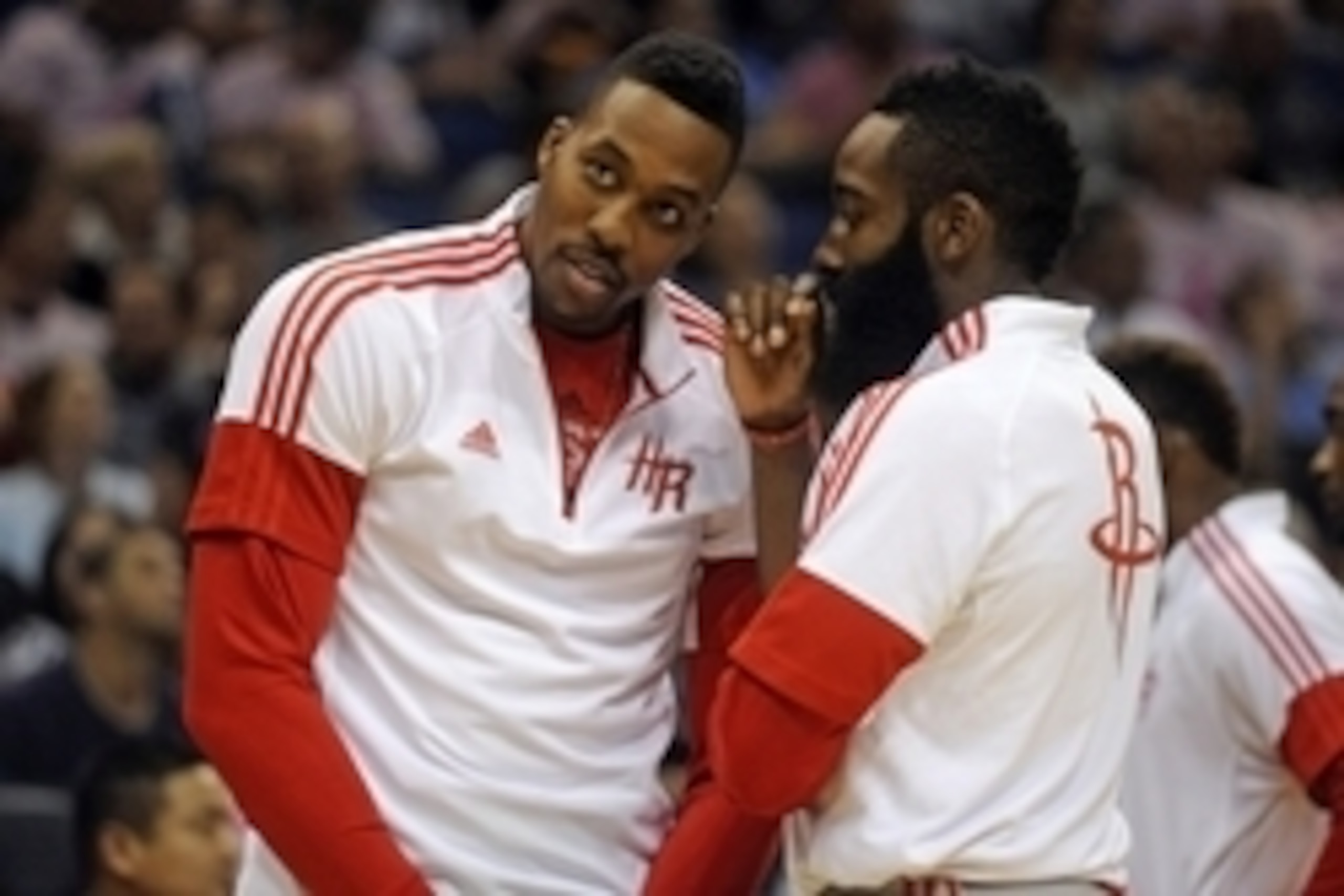 Oct 22, 2014; Orlando, FL, USA; Houston Rockets center Dwight Howard, left, talks with guard James Harden during a timeout as the Rockets beat the Orlando Magic 90-89 at Amway Center. Mandatory Credit: David Manning-USA TODAY Sports