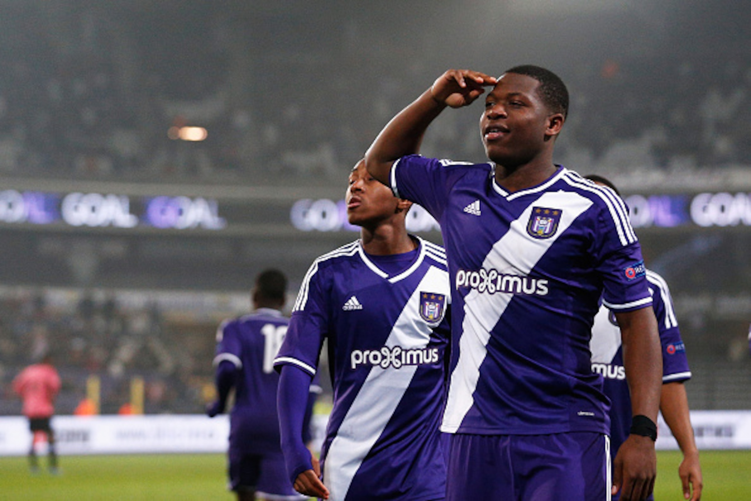 BRUSSELS, BELGIUM - MARCH 18:  Aaron Leya Iseka of Anderlecht celebrates scoring a goal from the penalty spot completing his hat trick during the UEFA Youth League quarter final match between RSC Anderlecht and FC Porto at Constant Vanden Stock Stadium on