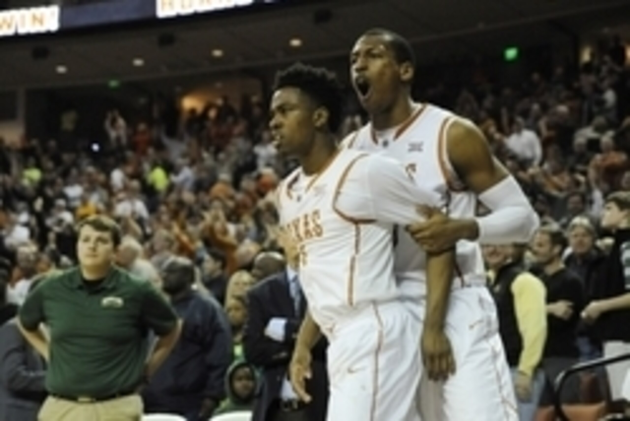 Mar 2, 2015; Austin, TX, USA; Texas Longhorns guard Isaiah Taylor (1) and forward Jonathan Holmes (10) react after beating the Baylor Bears at the Frank Erwin Special Events Center. Texas beat Baylor 61-59. Mandatory Credit: Brendan Maloney-USA TODAY Spor