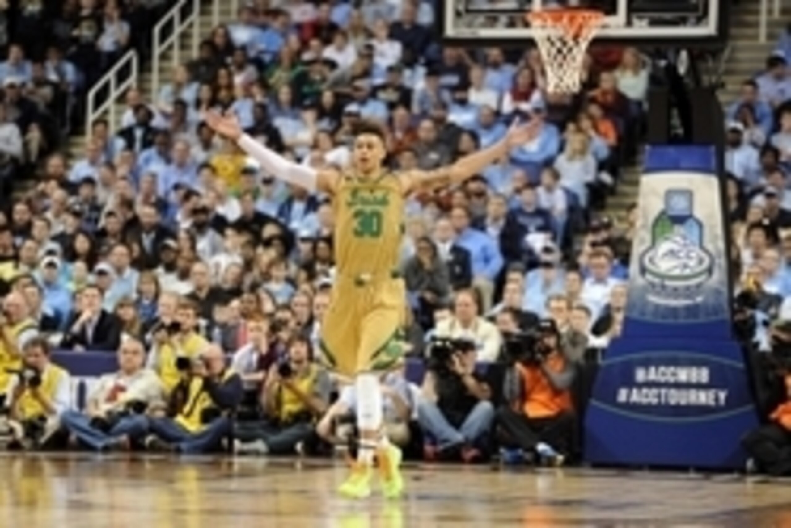 Mar 14, 2015; Greensboro, NC, USA; Notre Dame Fighting Irish forward Zach Auguste (30) celebrates during a game against the North Carolina Tar Heels in the second half during the championship game of the ACC Tournament at Greensboro Coliseum. The Notre Da Mar 14, 2015; Greensboro, NC, USA; Notre Dame Fighting Irish forward Zach Auguste (30) celebrates during a game against the North Carolina Tar Heels in the second half during the championship game of the ACC Tournament at Greensboro Coliseum. The Notre Da