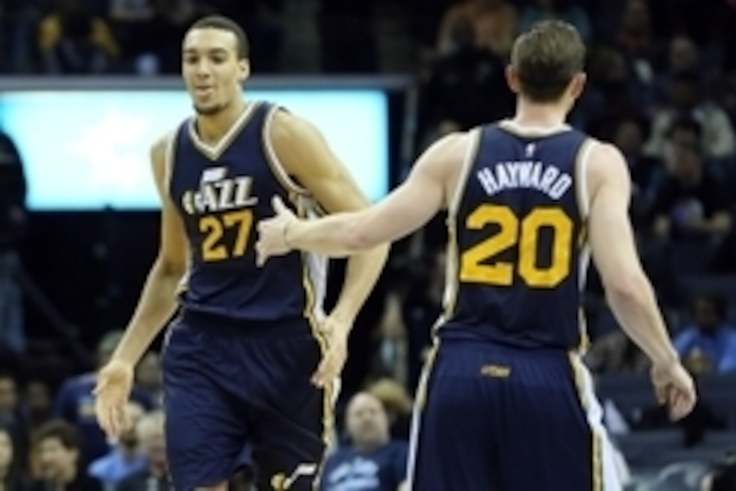 Mar 3, 2015; Memphis, TN, USA; Utah Jazz center Rudy Gobert (27) celebrates with guard Gordon Hayward (20) after a score against the Memphis Grizzlies in the second half at FedExForum. Utah defeated Memphis 93-82. Mandatory Credit: Nelson Chenault-USA TOD