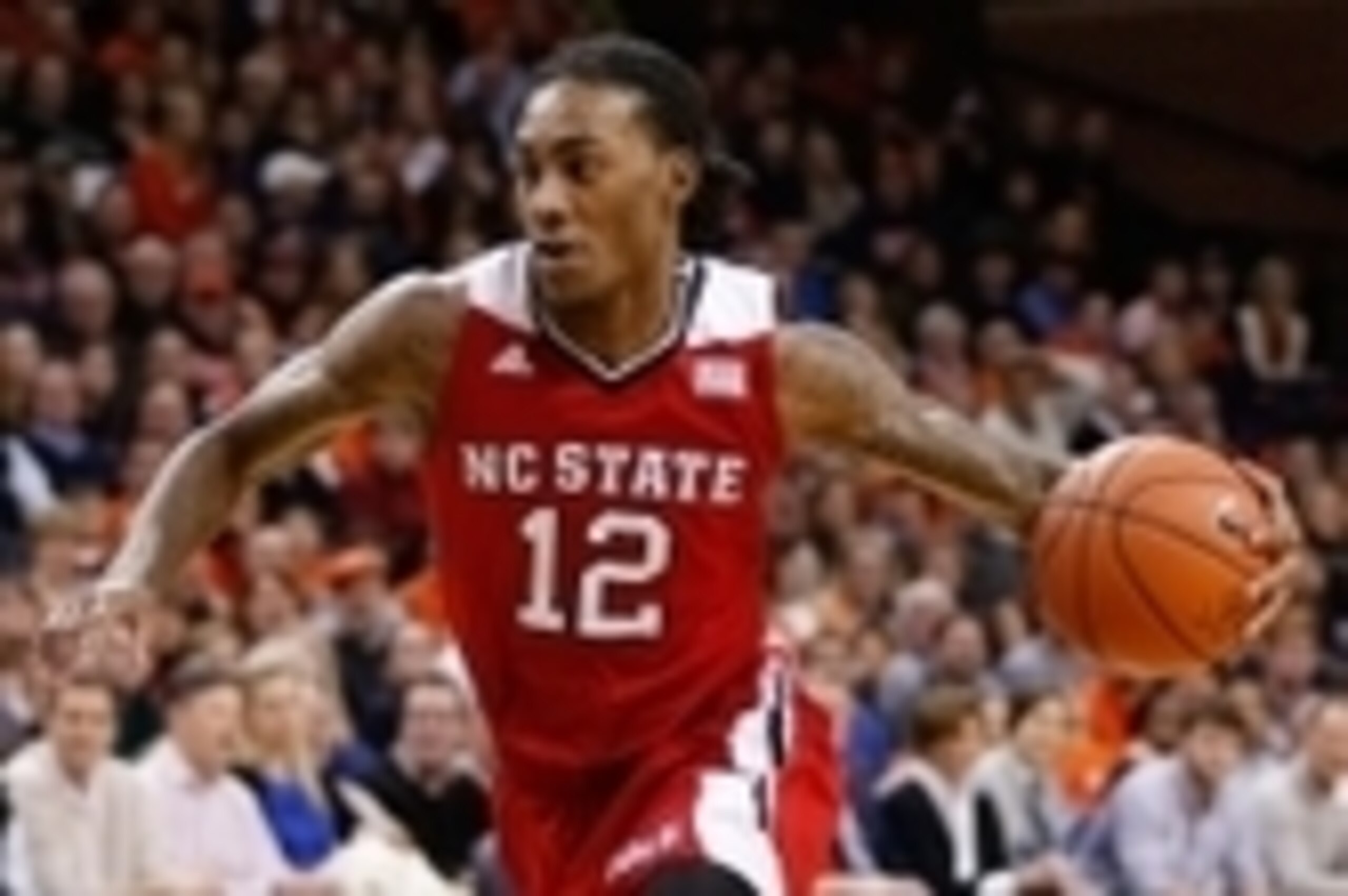 Jan 7, 2015; Charlottesville, VA, USA; North Carolina State Wolfpack guard Anthony Barber (12) dribbles the ball against the Virginia Cavaliers at John Paul Jones Arena. Mandatory Credit: Amber Searls-USA TODAY Sports