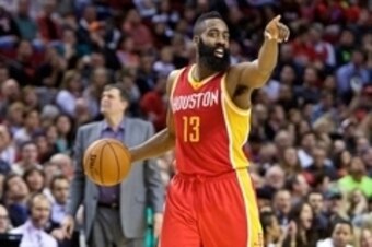 Mar 11, 2015; Portland, OR, USA; Houston Rockets guard James Harden (13) points against the Portland Trail Blazers during the fourth quarter at the Moda Center. Mandatory Credit: Craig Mitchelldyer-USA TODAY Sports