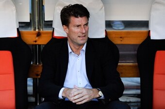 VALENCIA, SPAIN - SEPTEMBER 19:  Manager Michael Laudrup of Swansea City looks on during the UEFA Europa League Group A match between Valencia CF and Swansea City at Estadi de Mestalla on September 19, 2013 in Valencia, Spain.  (Photo by David Ramos/Getty