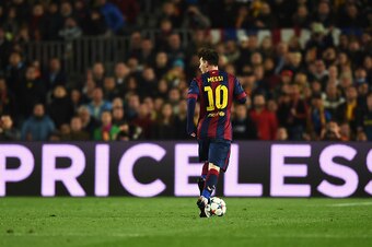 BARCELONA, SPAIN - MARCH 18: Lionel Messi of Barcelona runs with the ball during the UEFA Champions League Round of 16 second leg match between Barcelona and Manchester City at Camp Nou on March 18, 2015 in Barcelona, Spain.  (Photo by Michael Regan/Getty