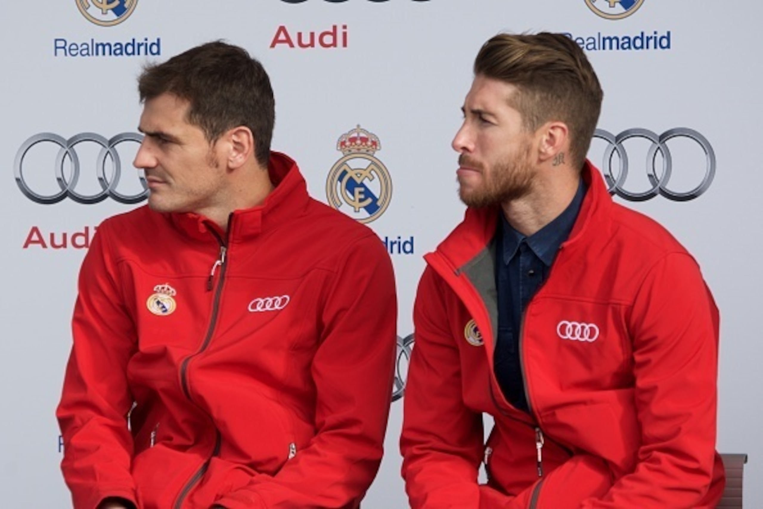 MADRID, SPAIN - DECEMBER 01:  Real Madrid players Iker Casillas (L) and  Sergio Ramos (R) attend the car handover of Audi at the Ciudad Deportiva del Real Madrid on December 1, 2014 in Madrid, Spain.  (Photo by Carlos Alvarez/Getty Images)