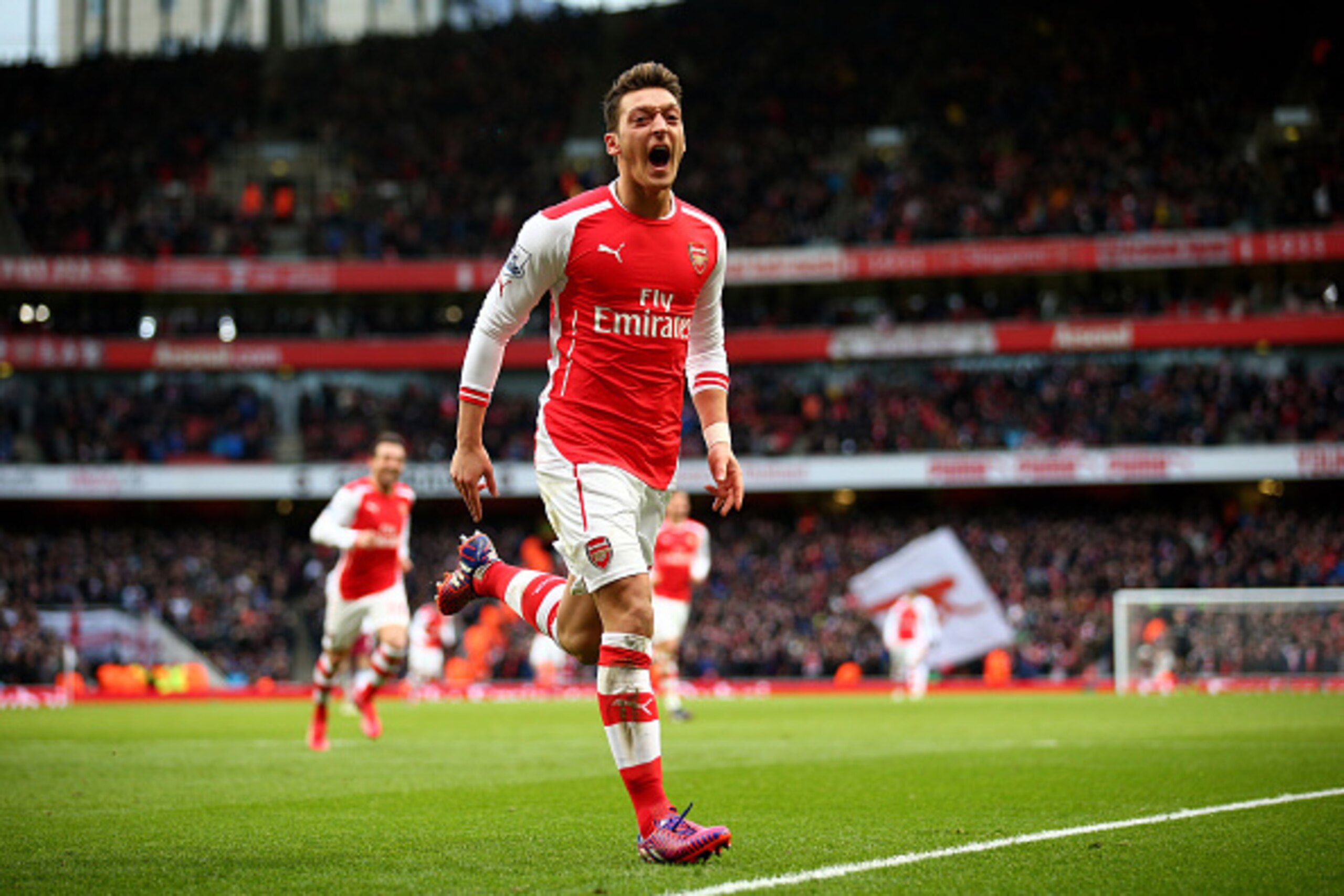 LONDON, ENGLAND - FEBRUARY 01: Mesut Oezil of Arsenal celebrates after scoring his team's second goal during the Barclays Premier League match between Arsenal and Aston Villa at the Emirates Stadium on February 1, 2015 in London, England. (Photo by Paul LONDON, ENGLAND - FEBRUARY 01: Mesut Oezil of Arsenal celebrates after scoring his team's second goal during the Barclays Premier League match between Arsenal and Aston Villa at the Emirates Stadium on February 1, 2015 in London, England. (Photo by Paul