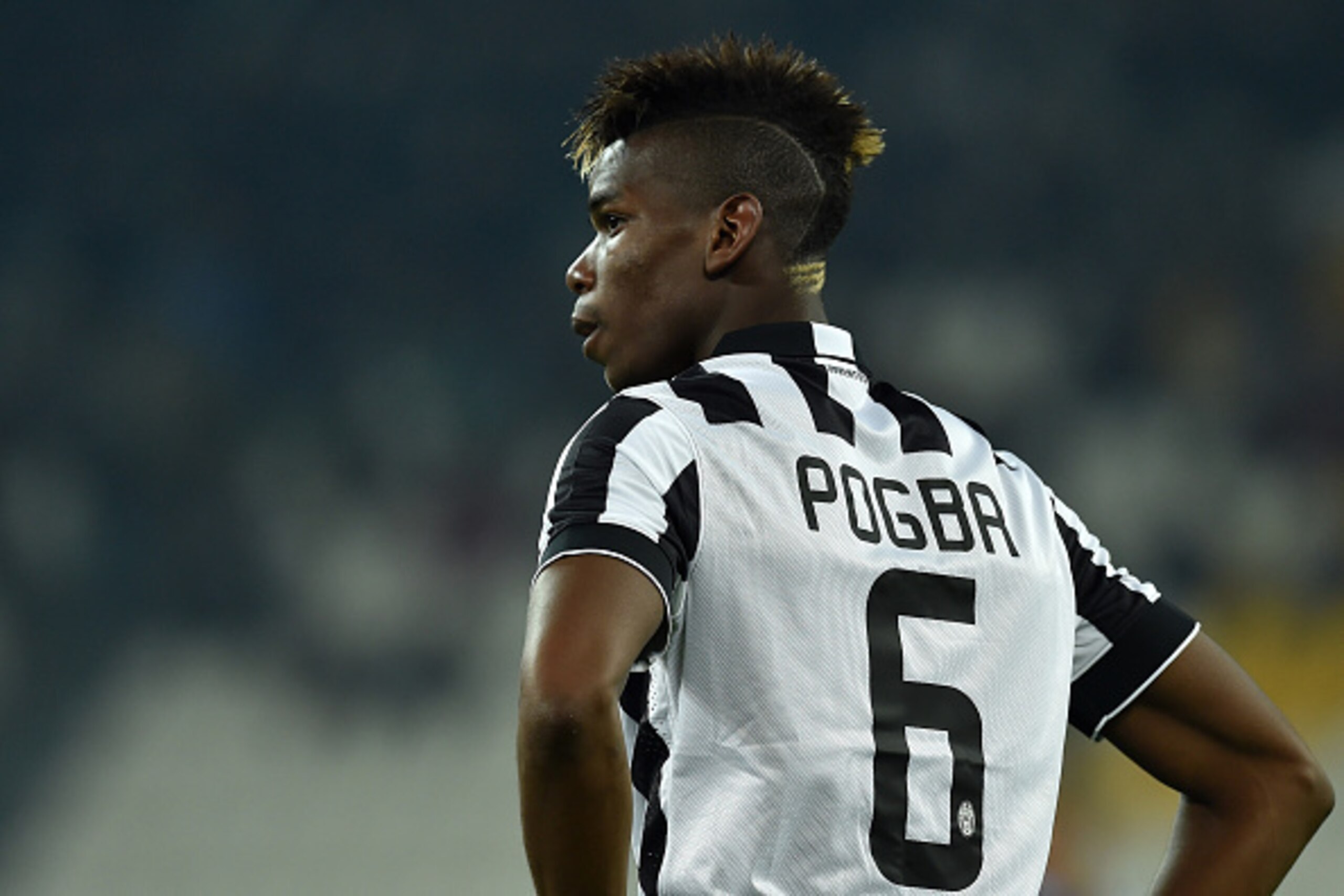 TURIN, ITALY - MARCH 09:  Paul Pogba of Juventus FC looks on during the Serie A match between Juventus FC and US Sassuolo Calcio at Juventus Arena on March 9, 2015 in Turin, Italy.  (Photo by Valerio Pennicino/Getty Images)