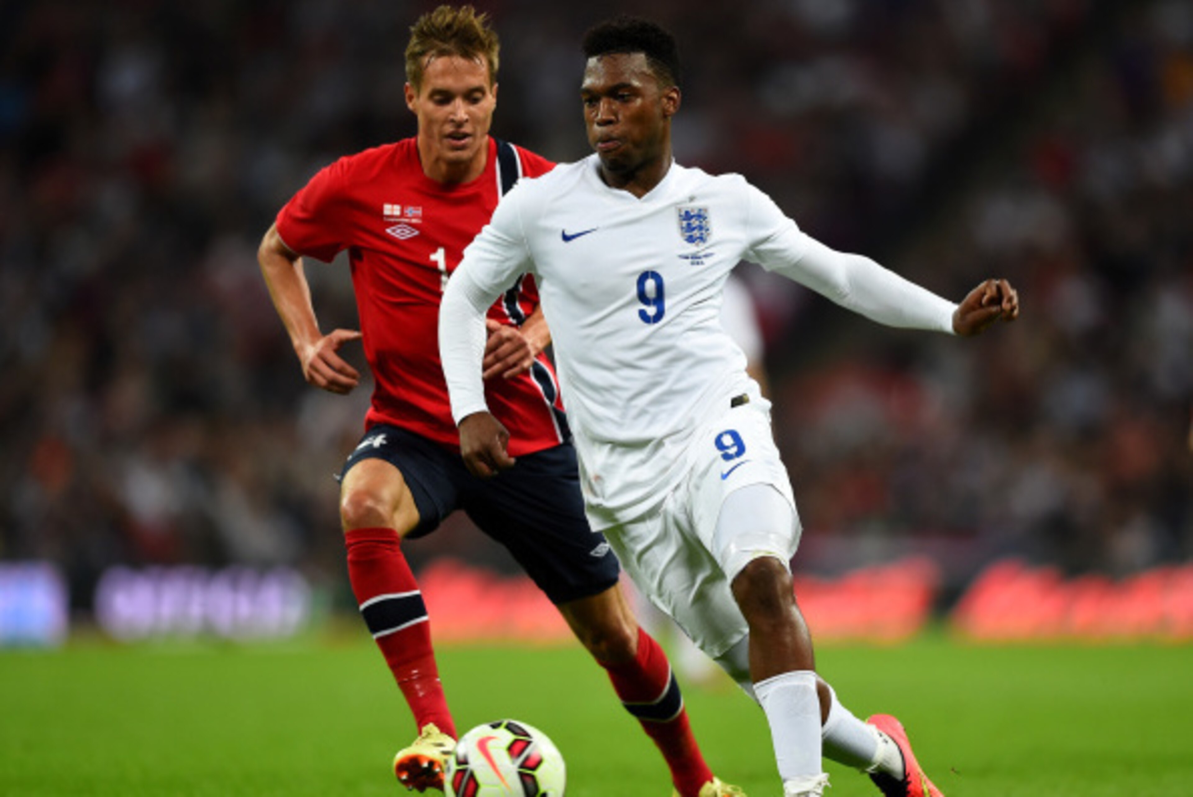 LONDON, ENGLAND - SEPTEMBER 03:  Daniel Sturridge of England runs past Anders Konradsen of Norway during the International friendly match between England and Norway at Wembley Stadium on September 3, 2014 in London, England.  (Photo by Laurence Griffiths/