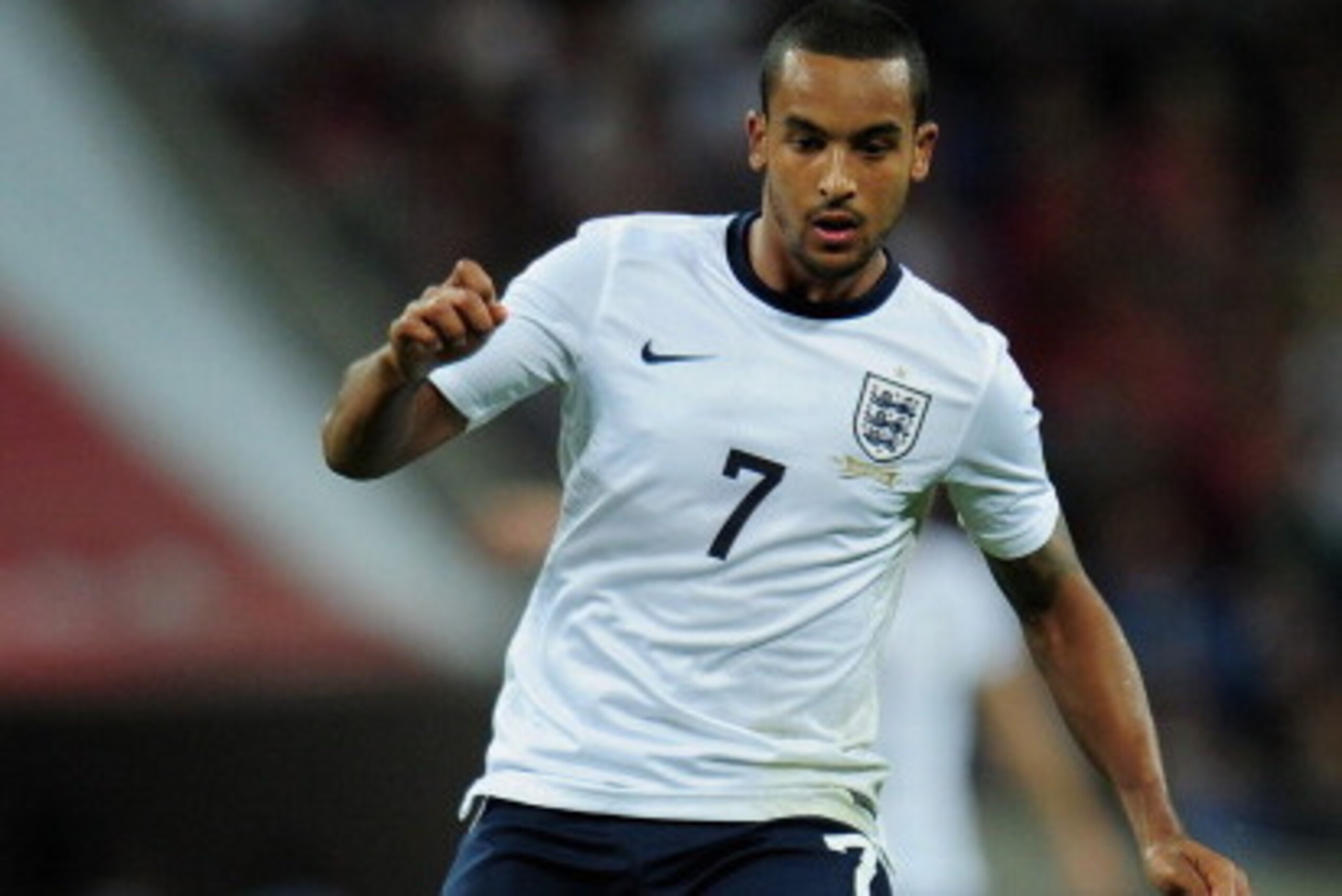 LONDON, ENGLAND - SEPTEMBER 06:  Theo Walcott of England in action during the FIFA 2014 World Cup Qualifying Group H match between England and Moldova at Wembley Stadium on September 6, 2013 in London, England.  (Photo by Shaun Botterill/Getty Images)
