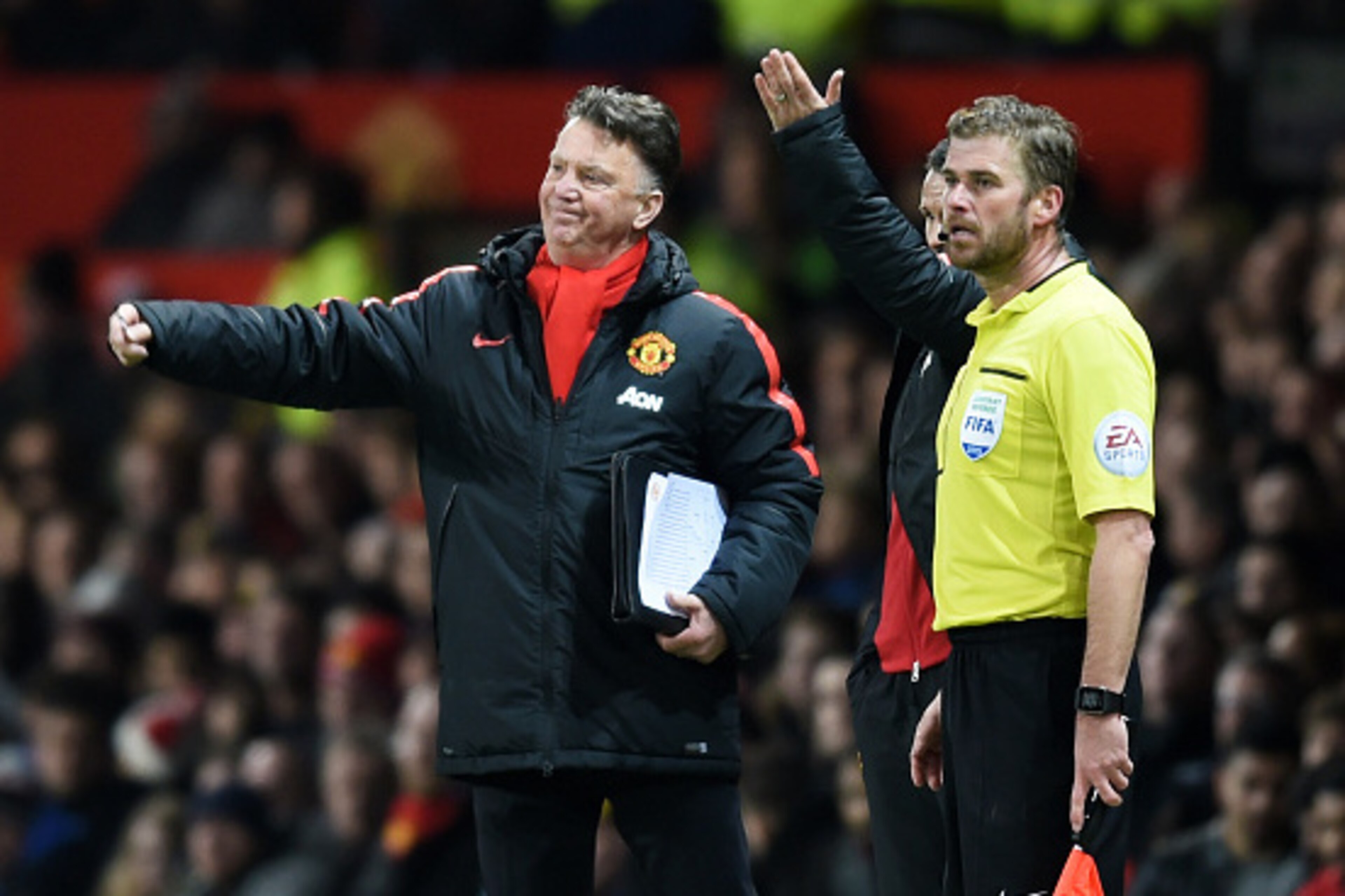 MANCHESTER, ENGLAND - MARCH 09:  Louis van Gaal the manager of Manchester United reacts during the FA Cup Quarter Final match between Manchester United and Arsenal at Old Trafford on March 9, 2015 in Manchester, England.  (Photo by Michael Regan/Getty Ima