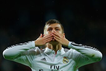 MADRID, SPAIN - NOVEMBER 08: Toni Kroos of Real Madrid CF celebrates scoring their third goal during the La Liga match between Real Madrid CF and Rayo Vallecano de Madrid at Estadio Santiago Bernabeu on November 8, 2014 in Madrid, Spain.  (Photo by Gonzal