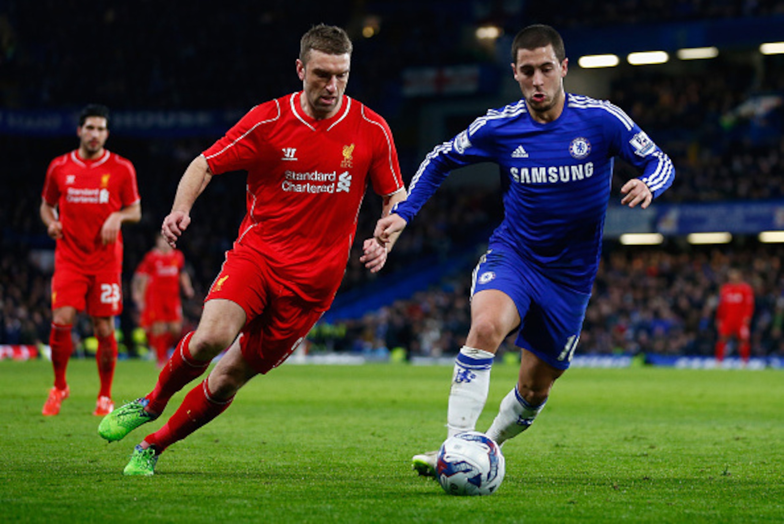 LONDON, ENGLAND - JANUARY 27:  Rickie Lambert of Liverpool marshalls Eden Hazard of Chelsea during the Capital One Cup Semi-Final second leg between Chelsea and Liverpool at Stamford Bridge on January 27, 2015 in London, England.  (Photo by Julian Finney/