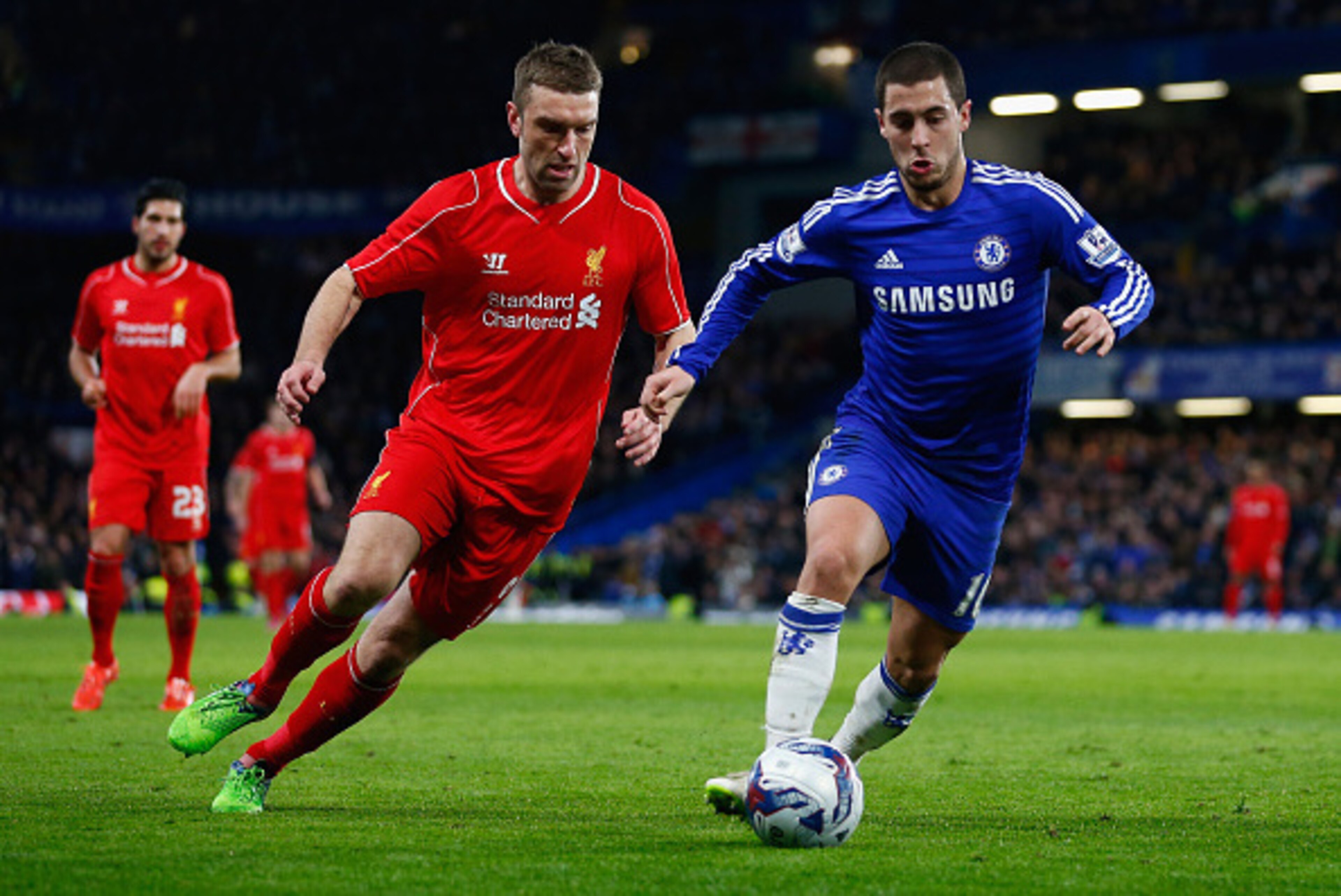 LONDON, ENGLAND - JANUARY 27:  Rickie Lambert of Liverpool marshalls Eden Hazard of Chelsea during the Capital One Cup Semi-Final second leg between Chelsea and Liverpool at Stamford Bridge on January 27, 2015 in London, England.  (Photo by Julian Finney/