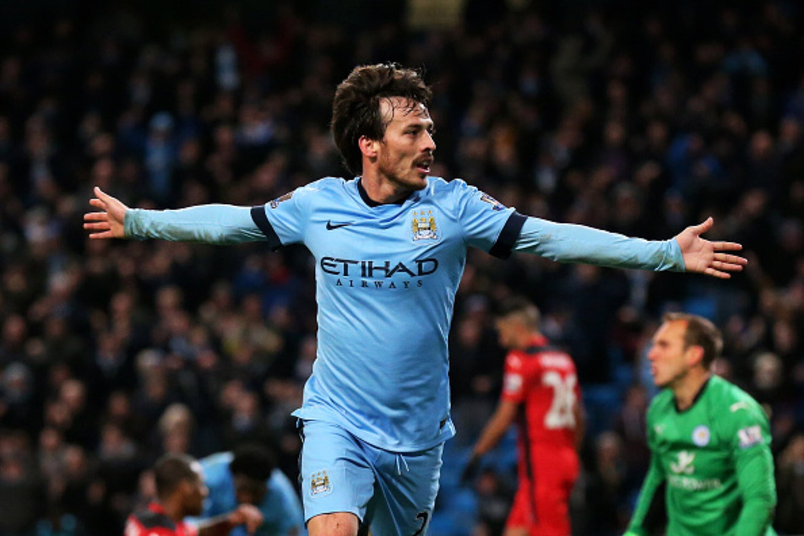 MANCHESTER, ENGLAND - MARCH 04:  David Silva of Manchester City celebrates after scoring the opening goal during the Barclays Premier League match between Manchester City and Leicester City at the Etihad Stadium on March 4, 2015 in Manchester, England.  (