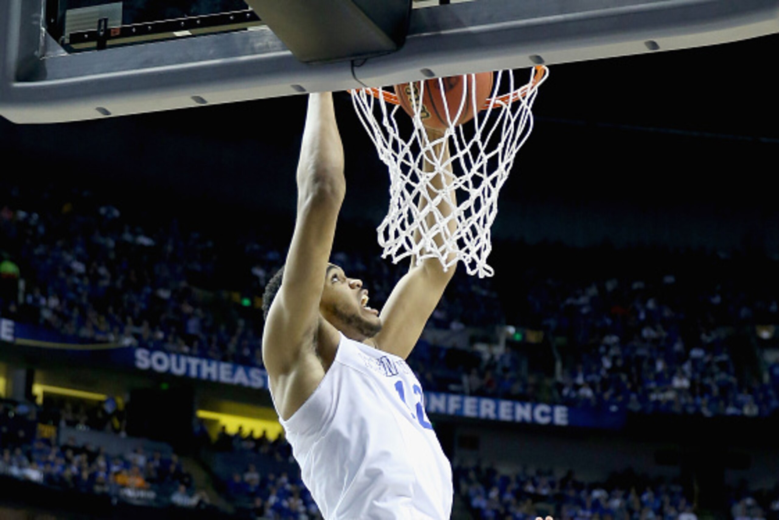 NASHVILLE, TN - MARCH 13: Karl-Anthony Towns #12 of the Kentucky Wildcats dunks the ball against the Florida Gators during the quaterfinals of the SEC Basketball Tournament at Bridgestone Arena on March 13, 2015 in Nashville, Tennessee. (Photo by Andy L NASHVILLE, TN - MARCH 13: Karl-Anthony Towns #12 of the Kentucky Wildcats dunks the ball against the Florida Gators during the quaterfinals of the SEC Basketball Tournament at Bridgestone Arena on March 13, 2015 in Nashville, Tennessee. (Photo by Andy L