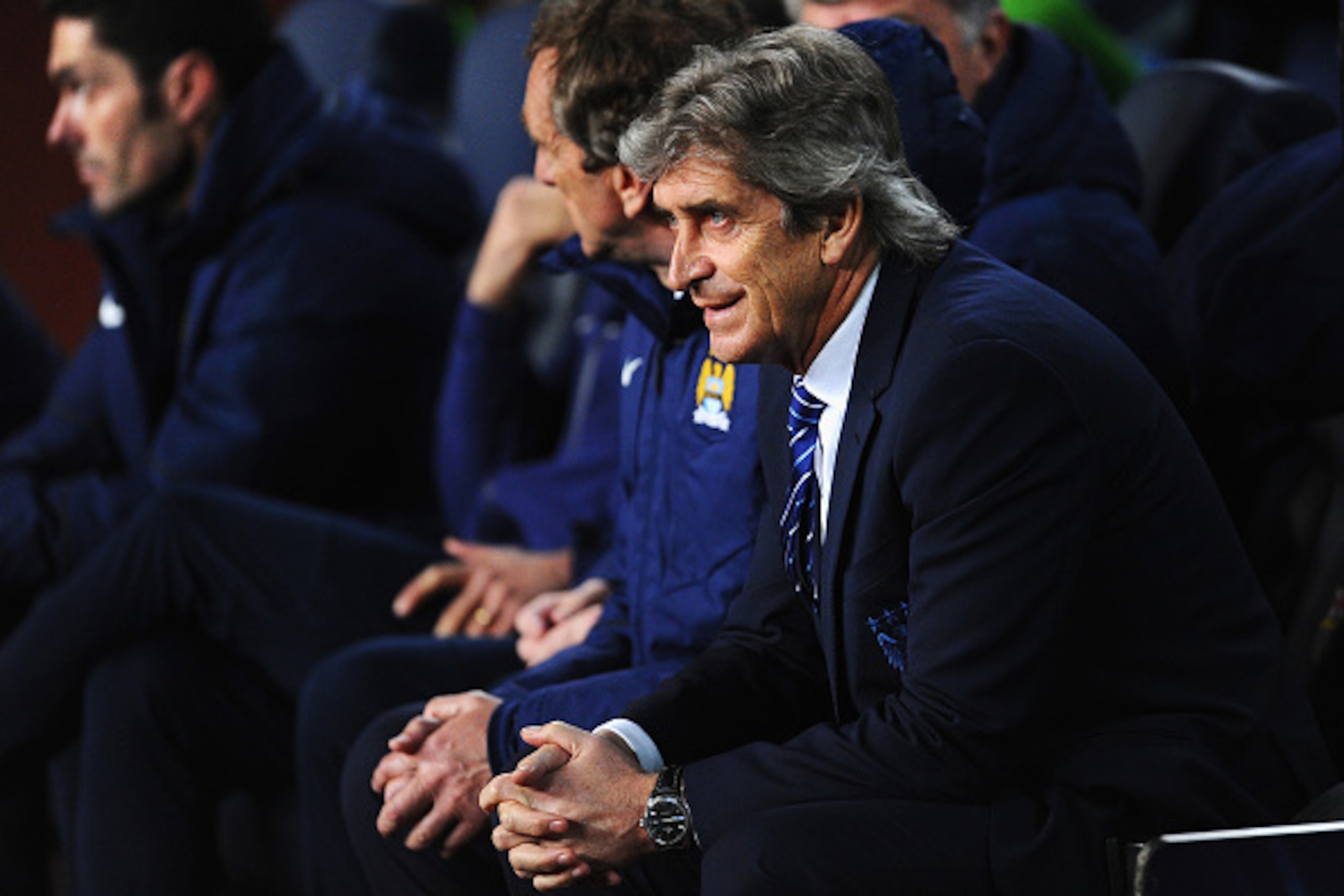 BARCELONA, SPAIN - MARCH 18: Manuel Pellegrini, coach of Manchester City looks on during the UEFA Champions League Round of 16 second leg match between Barcelona and Manchester City at Camp Nou on March 18, 2015 in Barcelona, Spain. (Photo by David Ramos BARCELONA, SPAIN - MARCH 18: Manuel Pellegrini, coach of Manchester City looks on during the UEFA Champions League Round of 16 second leg match between Barcelona and Manchester City at Camp Nou on March 18, 2015 in Barcelona, Spain. (Photo by David Ramos