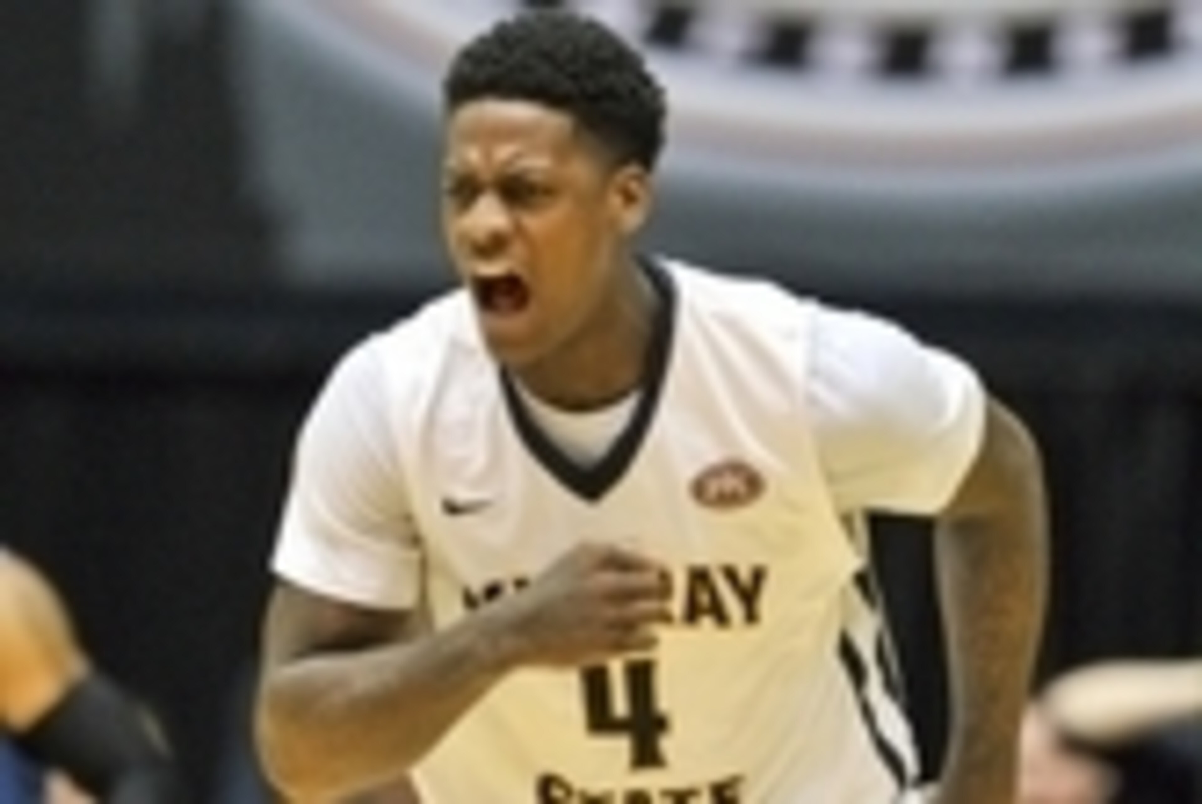 Mar 6, 2015; Nashville, TN, USA; Murray State Racers forward Jarvis Williams (4) reacts after dunking the ball against the Morehead State Eagles to tie the game during the second half at Nashville Municipal Auditorium. Murray State won 80-77. Mandatory Cr
