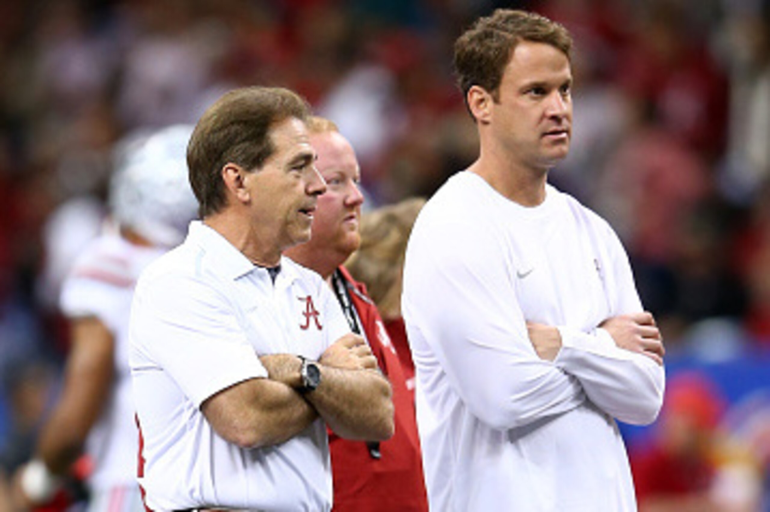 NEW ORLEANS, LA - JANUARY 01:  Head coach Nick Saban of the Alabama Crimson Tide looks on with  Lane Kiffin Offensive Coordinator on the field prior to the All State Sugar Bowl against the Ohio State Buckeyes at the Mercedes-Benz Superdome on January 1, 2
