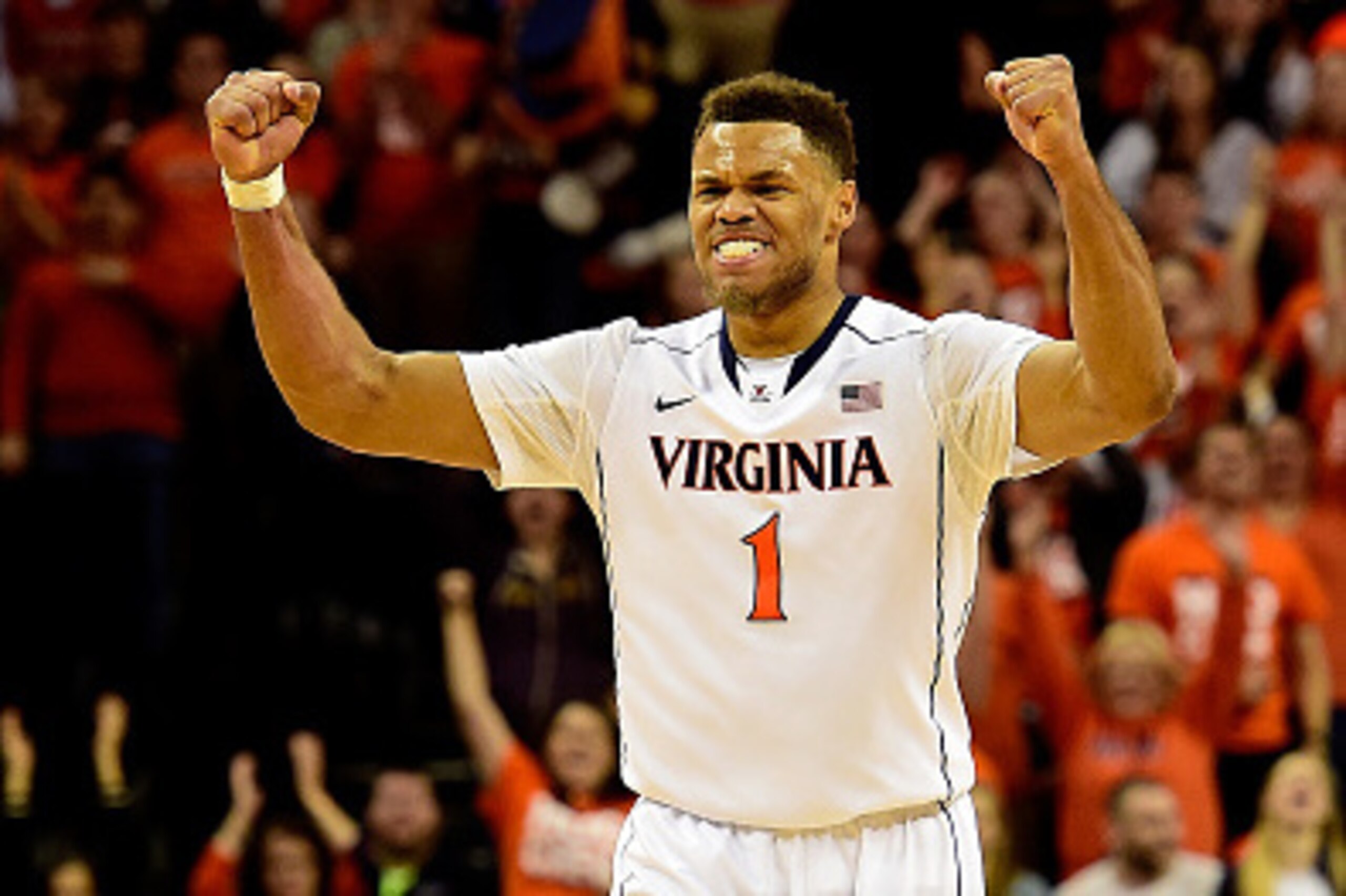 CHARLOTTESVILLE, VA - JANUARY 07:  Justin Anderson #1 of the Virginia Cavaliers celebrates after a basket in the second half during a game against the North Carolina State Wolfpack at John Paul Jones Arena on January 7, 2015 in Charlottesville, Virginia. 