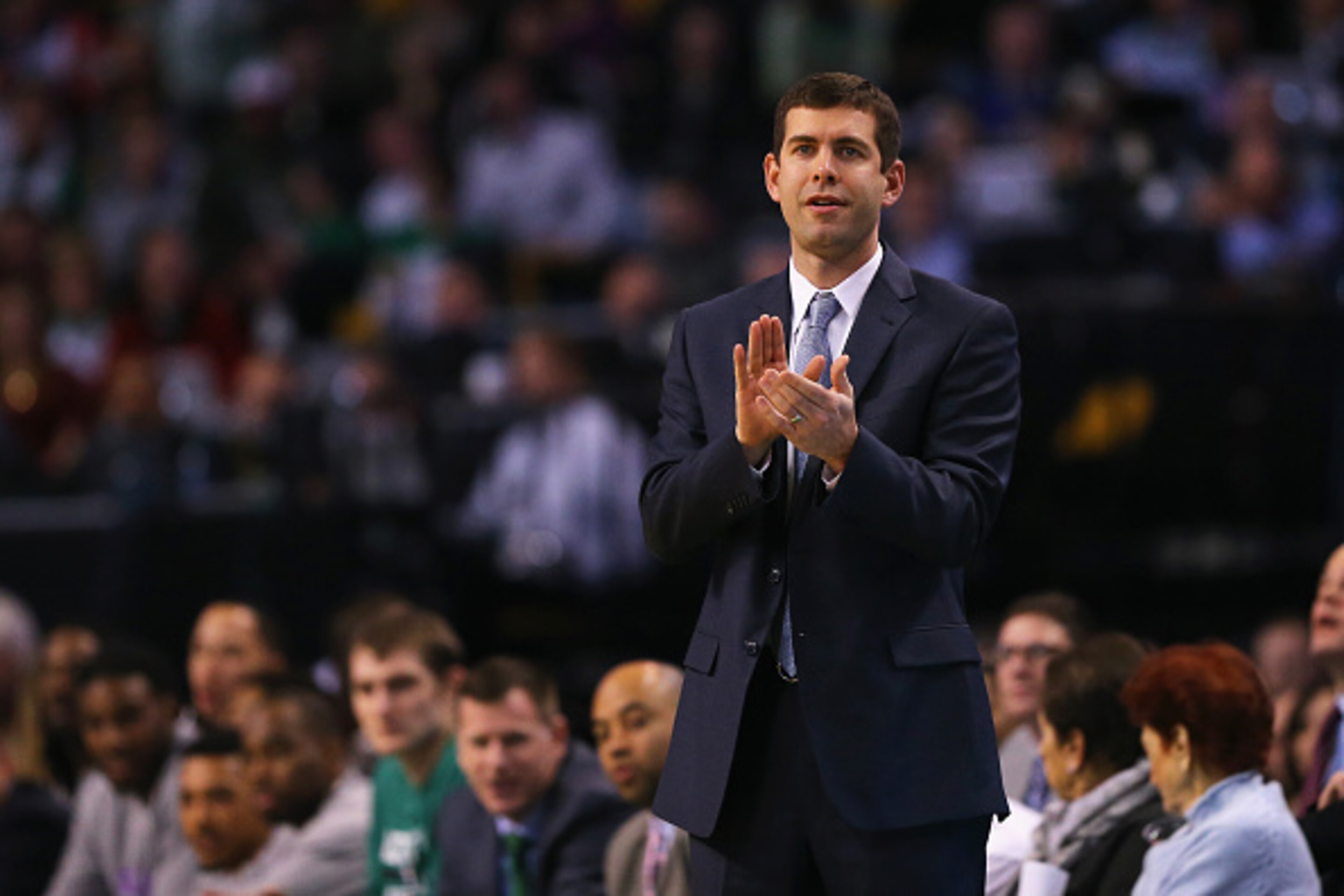 BOSTON, MA - FEBRUARY 06:  Brad Stevens of the Boston Celtics looks on during the game against the Philadelphia 76ers at TD Garden on February 6, 2015 in Boston, Massachusetts. The Celtics defeat the 76ers 107-96. NOTE TO USER: User expressly acknowledges