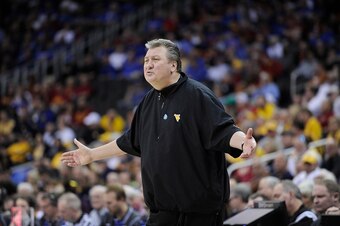 KANSAS CITY, MO - MARCH 12:  Bob Huggins head coach of the  Baylor Bears reacts during a game against the West Virginia Mountaineers during the quarterfinal round of the Big 12 basketball tournament at Sprint Center on March 12, 2015 in Kansas City, Misso