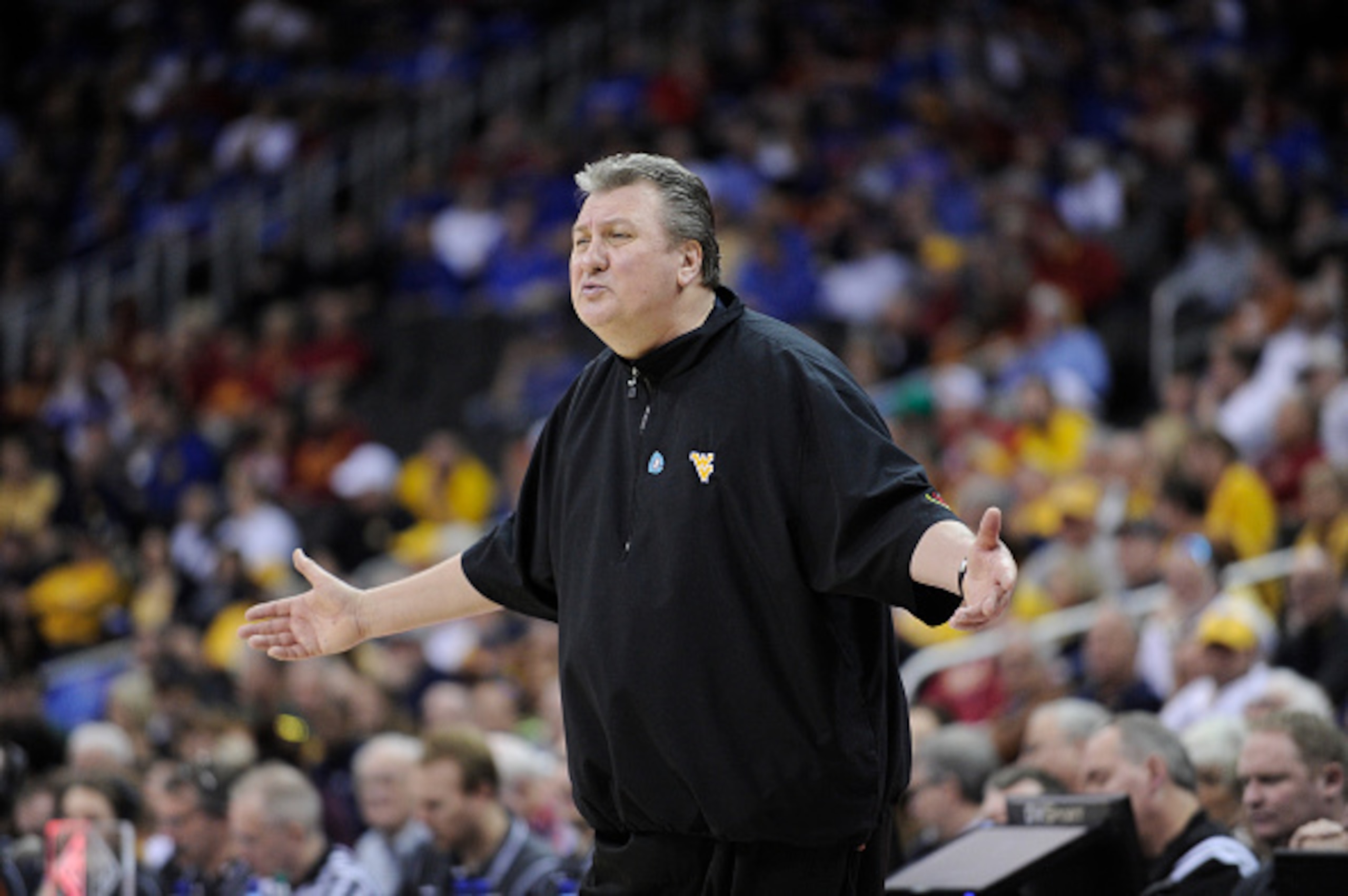 KANSAS CITY, MO - MARCH 12:  Bob Huggins head coach of the  Baylor Bears reacts during a game against the West Virginia Mountaineers during the quarterfinal round of the Big 12 basketball tournament at Sprint Center on March 12, 2015 in Kansas City, Misso