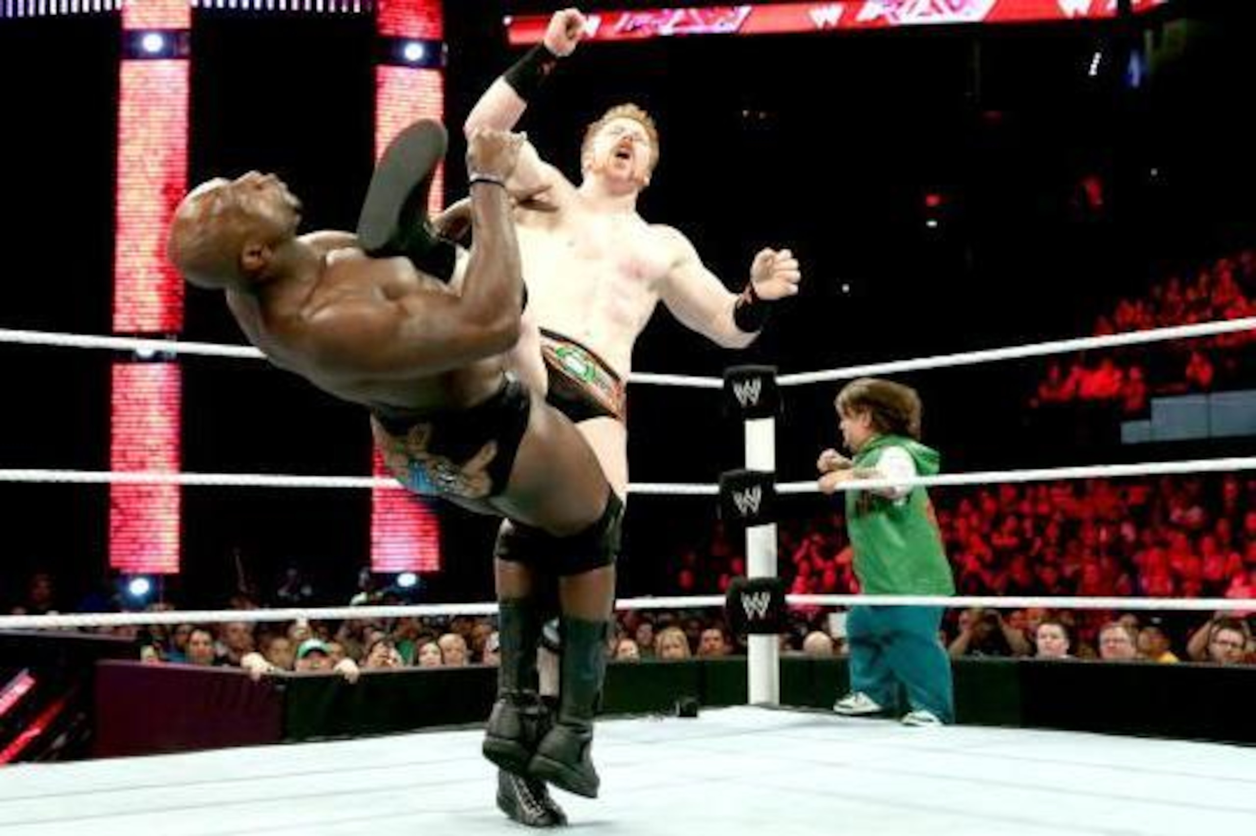 Sheamus hits Titus O'Neil with a Brogue Kick