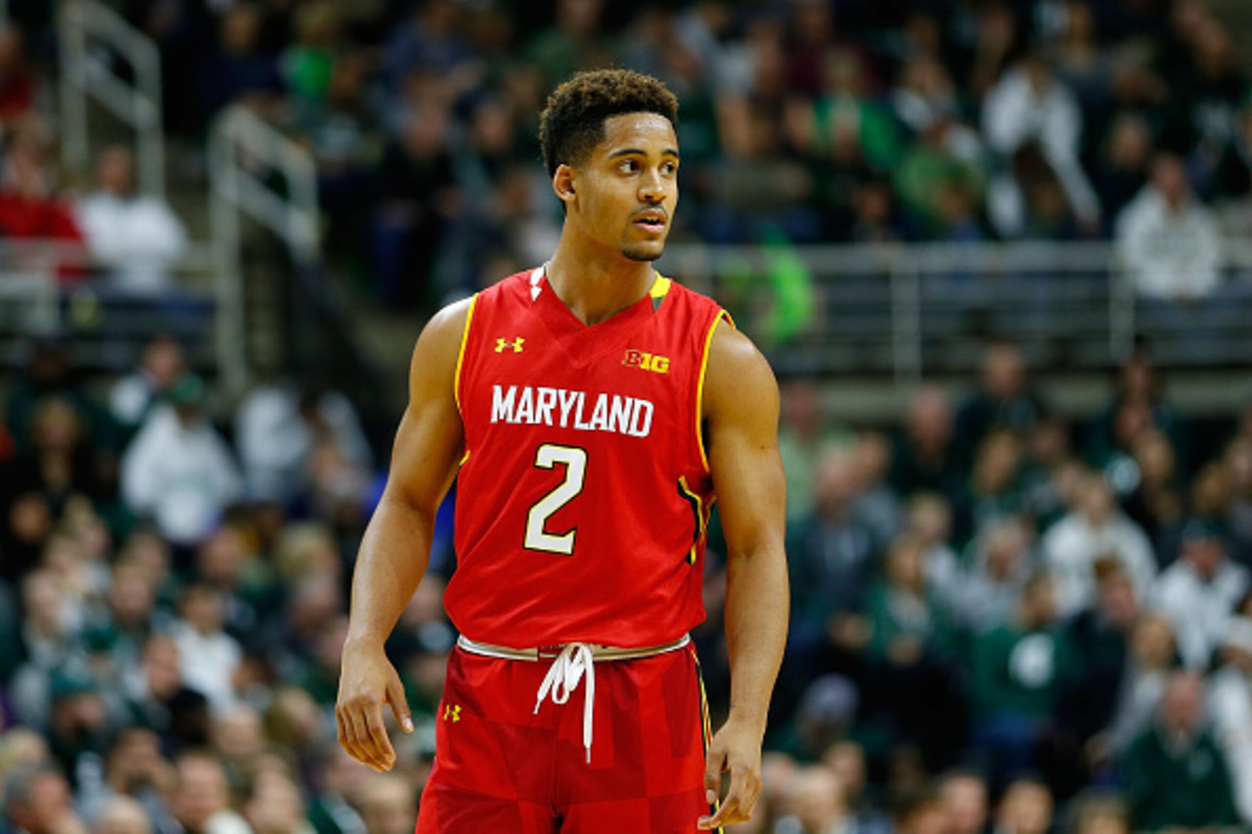 EAST LANSING, MI - DECEMBER 30:  Melo Trimble #2 of the Maryland Terrapins brings the ball up court during the second half of the game against the Michigan State Spartans at Breslin Center on December 30, 2014 in East Lansing, Michigan. Maryland defeated 