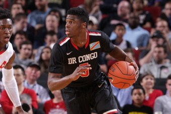 PORTLAND, OR - APRIL 12:  Emmanuel Mudiay #5 of the World Team dribbles the ball during the game against Team USA on April 12, 2014 at the Moda Center Arena in Portland, Oregon. NOTE TO USER: User expressly acknowledges and agrees that, by downloading and