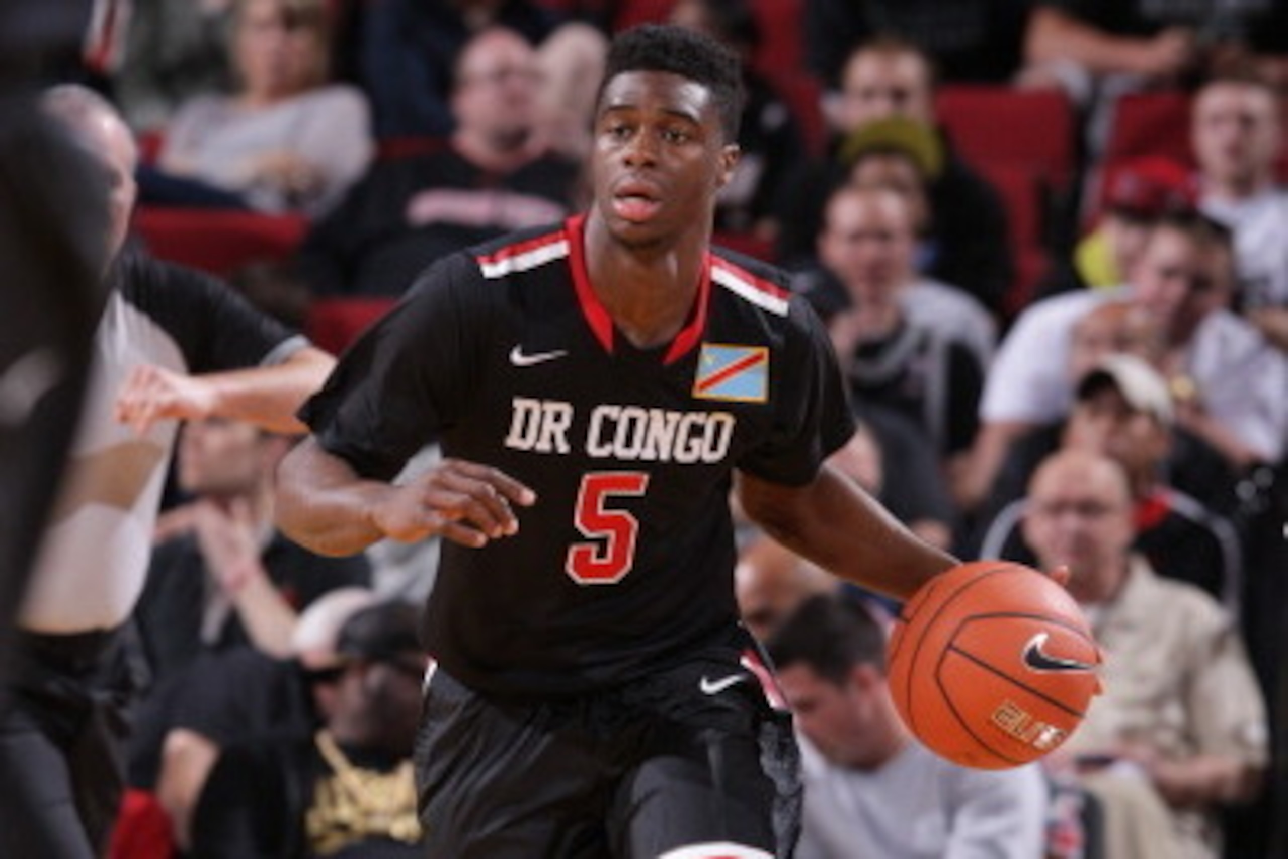 PORTLAND, OR - APRIL 12: Emmanuel Mudiay #5 of the World Team dribbles the ball during the game against Team USA on April 12, 2014 at the Moda Center Arena in Portland, Oregon. NOTE TO USER: User expressly acknowledges and agrees that, by downloading and PORTLAND, OR - APRIL 12: Emmanuel Mudiay #5 of the World Team dribbles the ball during the game against Team USA on April 12, 2014 at the Moda Center Arena in Portland, Oregon. NOTE TO USER: User expressly acknowledges and agrees that, by downloading and