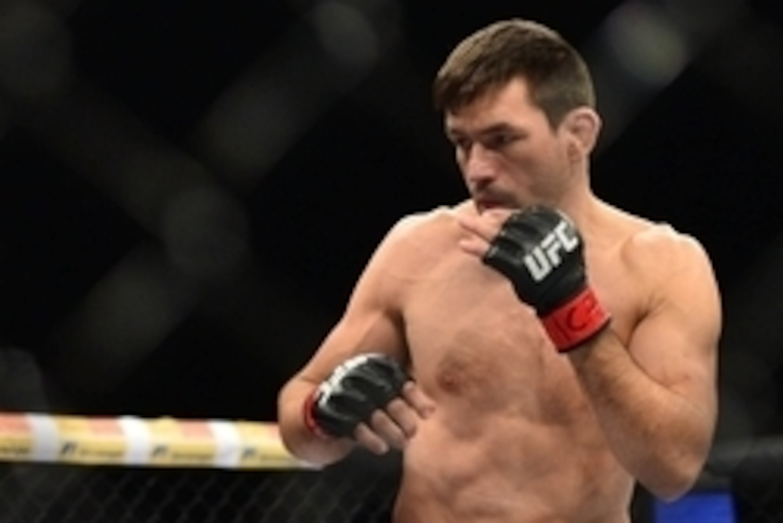 May 31, 2014; Sao Paulo, SP, BRAZIL; Demian Maia (red gloves) during his fight against Alexander Yakovlev (blue gloves) during the TUF Brazil 3 Finale at Ibirapuera  Gymnasium. Mandatory Credit: Jason Silva-USA TODAY Sports