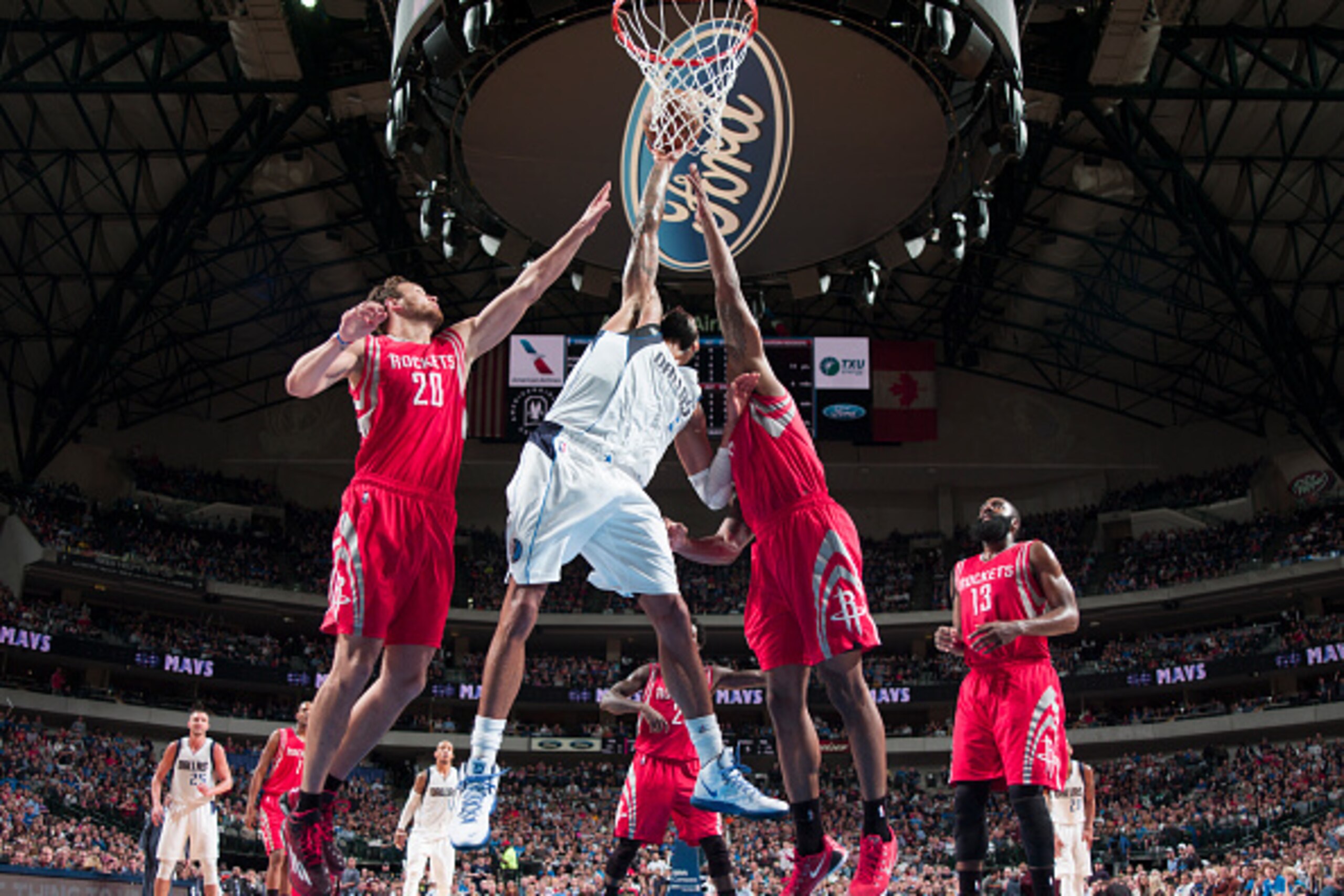DALLAS, TX - FEBRUARY 20: Tyson Chandler #6 of the Dallas Mavericks shoots against the Houston Rockets on February 20, 2015 at the American Airlines Center in Dallas, Texas. NOTE TO USER: User expressly acknowledges and agrees that, by downloading and or 